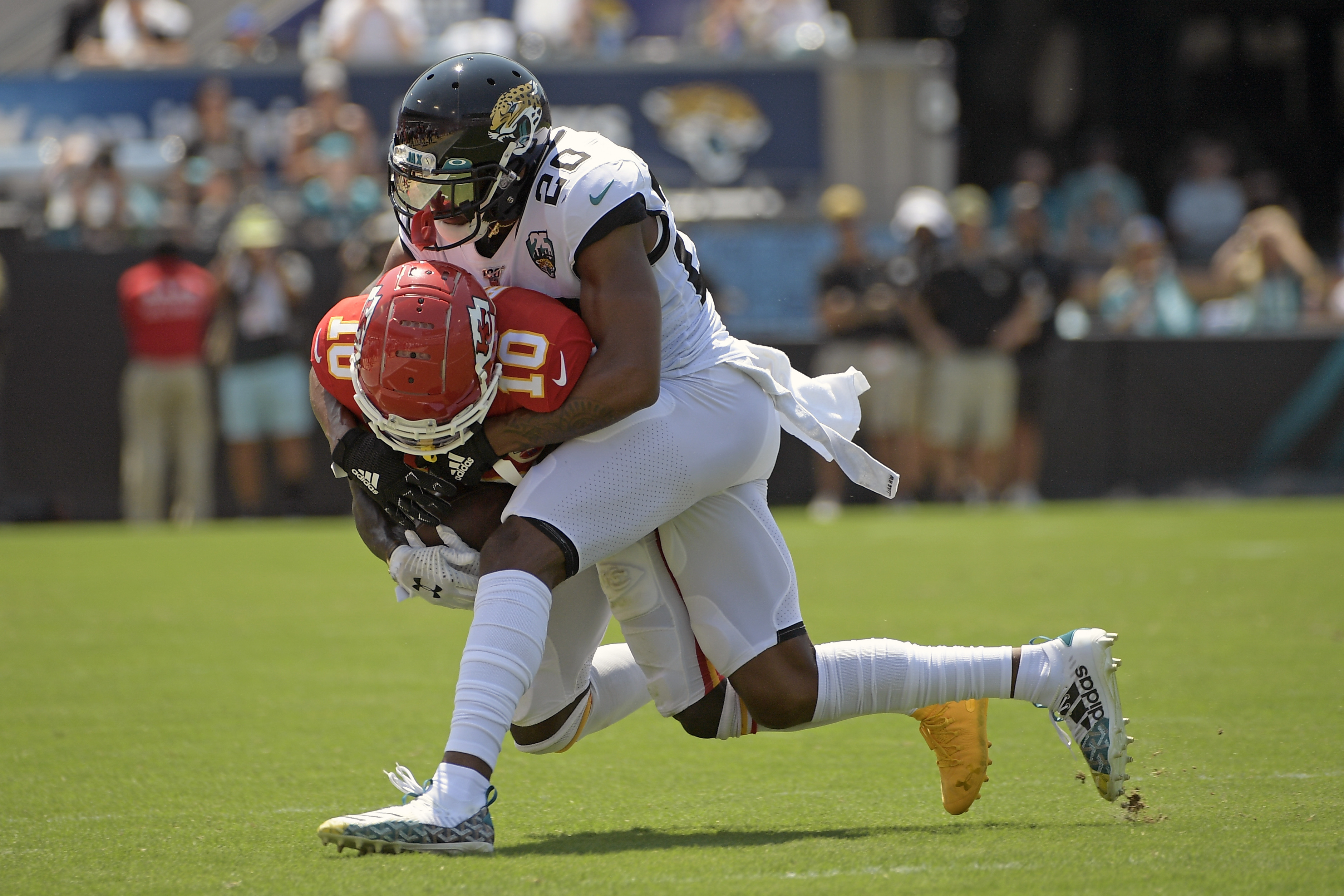 Jalen Ramsey with the hit stick on Tyreek Hill in flag football 