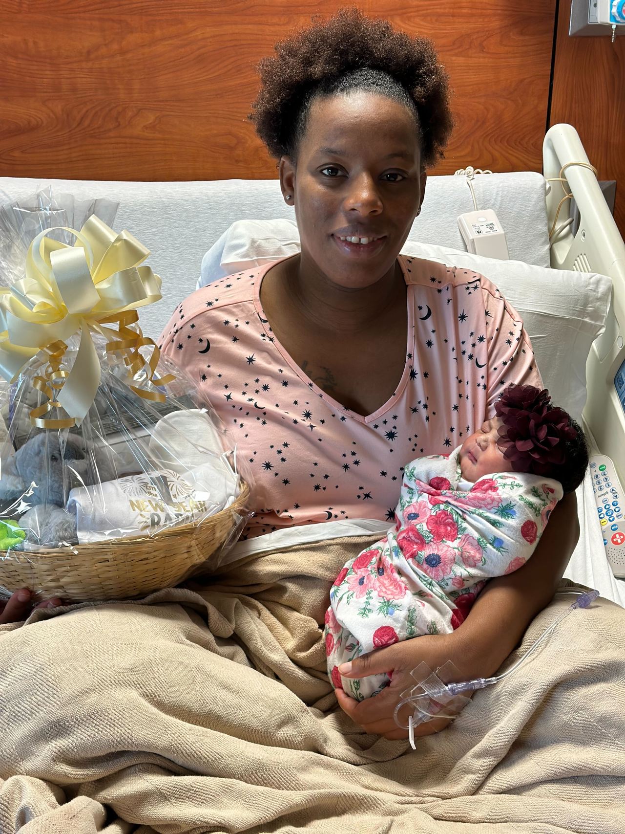 black newborn baby girl in hospital