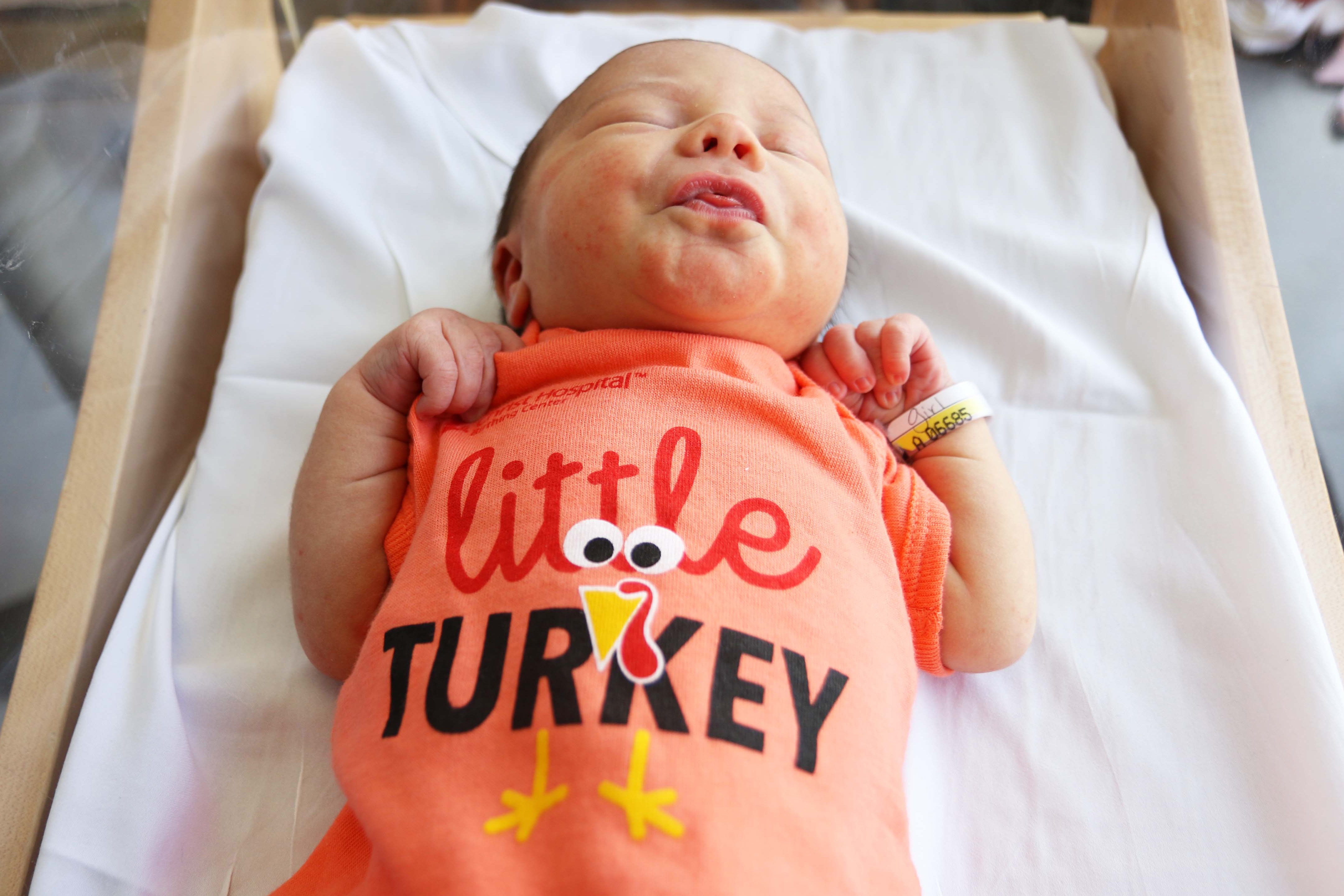 Newborns at Christ Hospital given football draft pick onesies