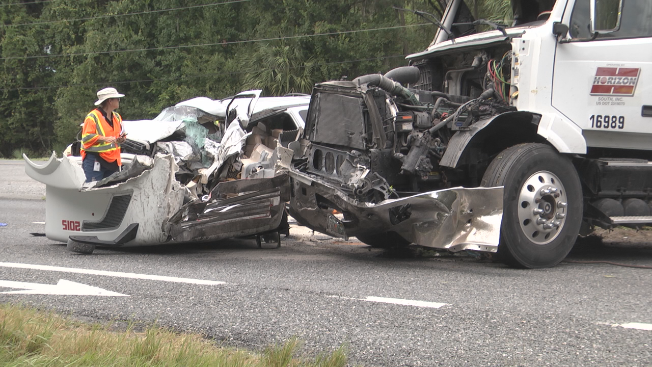 Semi truck and car crash, sending 12-year-old to hospital