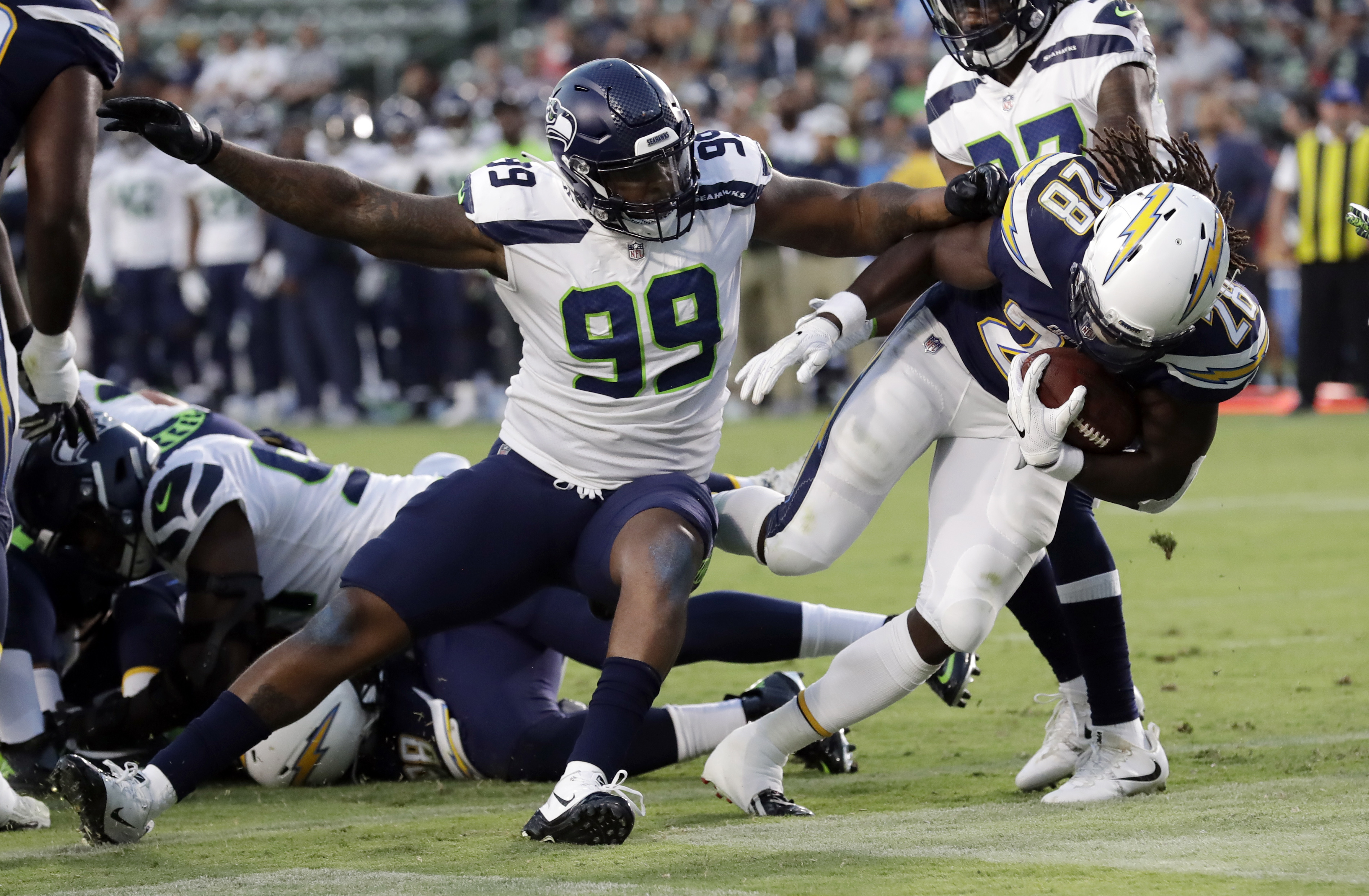 Seattle Seahawks defensive end Quinton Jefferson (99) reacts after