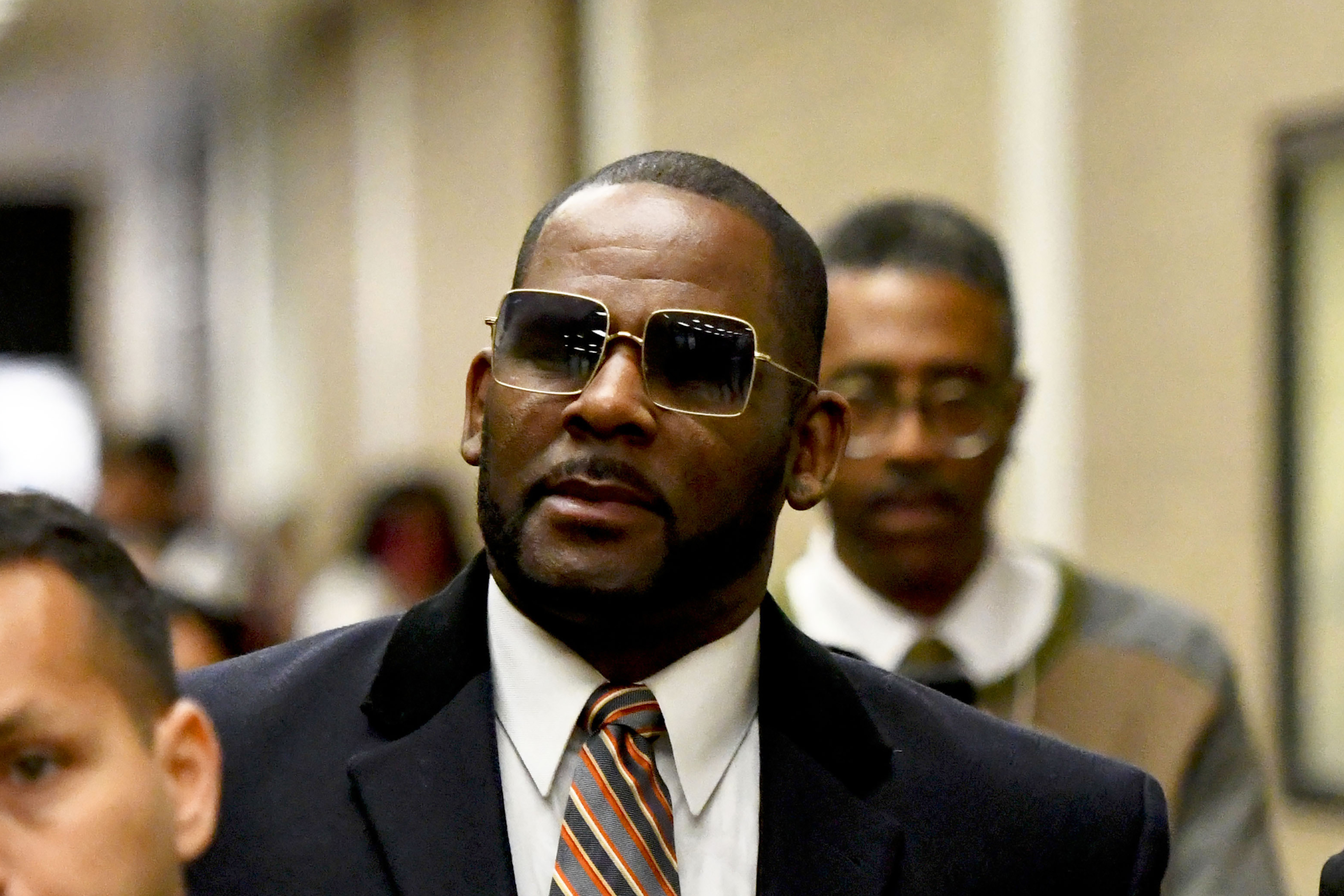 Sex Satisfied Blackmail - R. Kelly convicted of child porn, enticing girls for sex