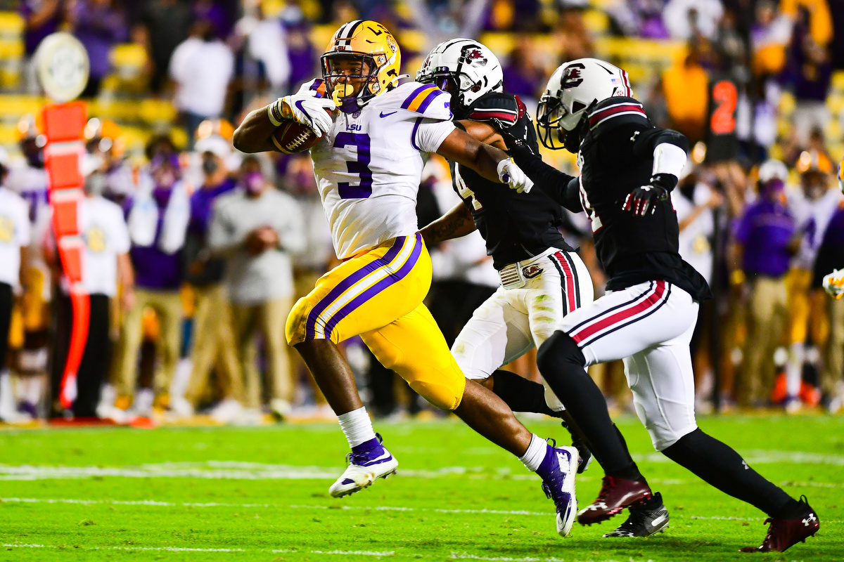 PHOTO: LSU's Nike Pro Combat Uniforms Include Purple Sneakers For