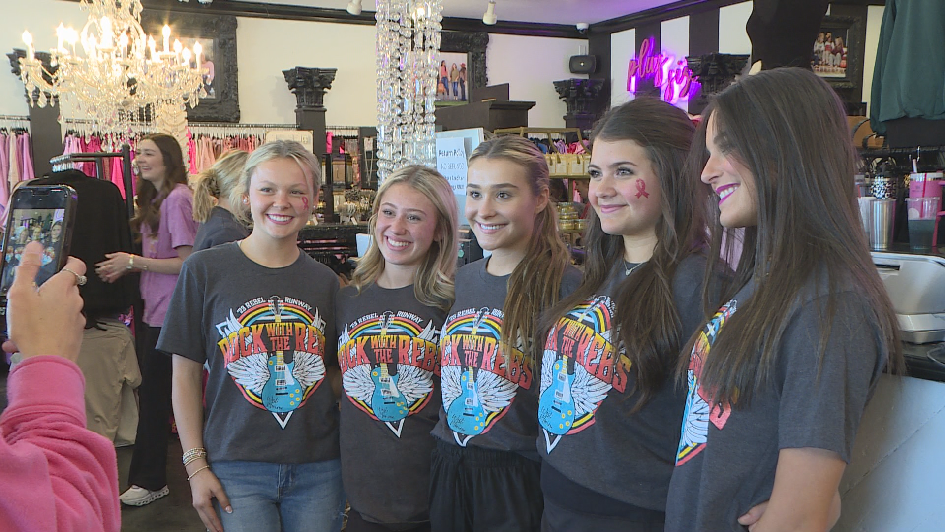 WM boutique observes breast cancer awareness supports local child