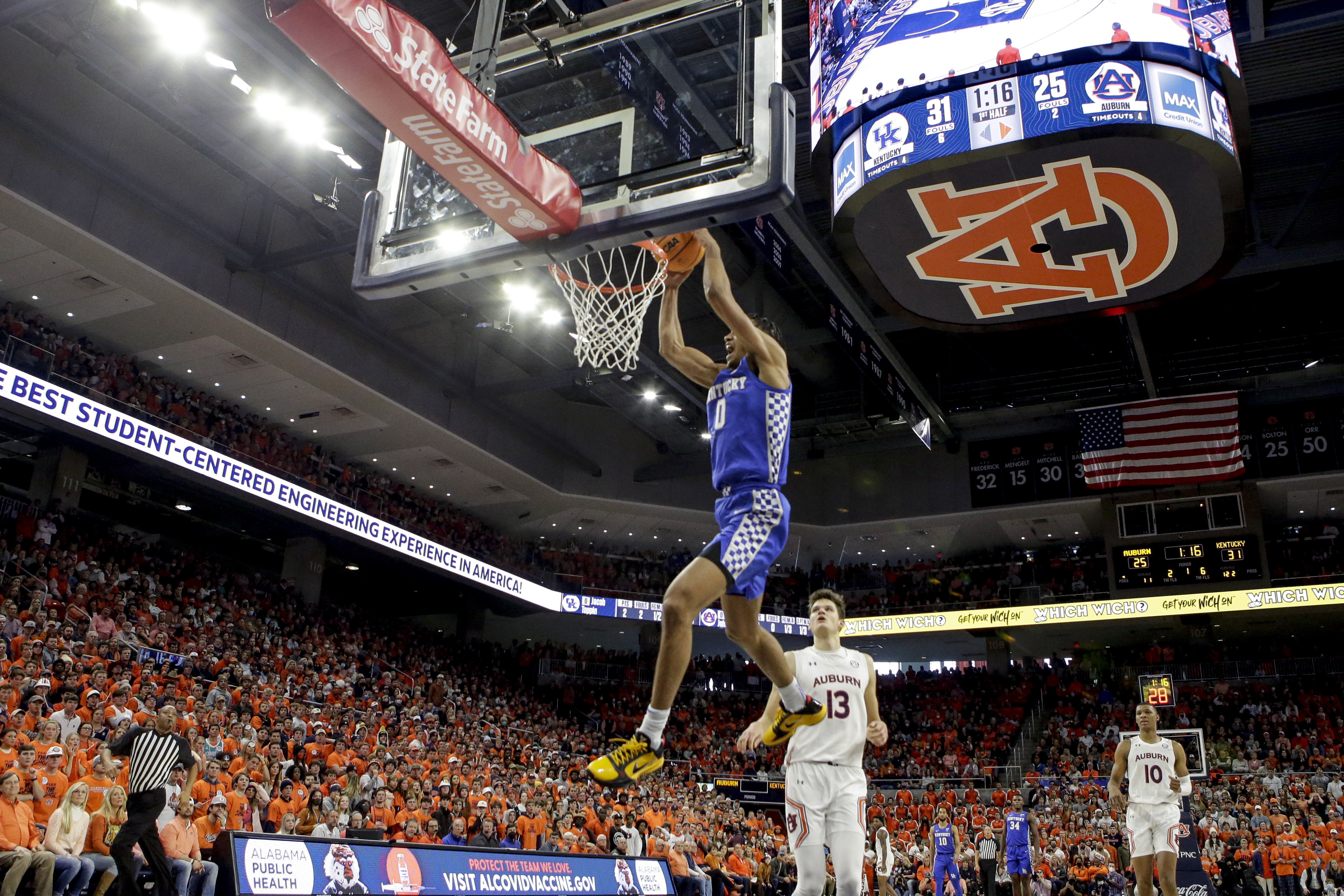 AP Poll: Cats hold on after road loss