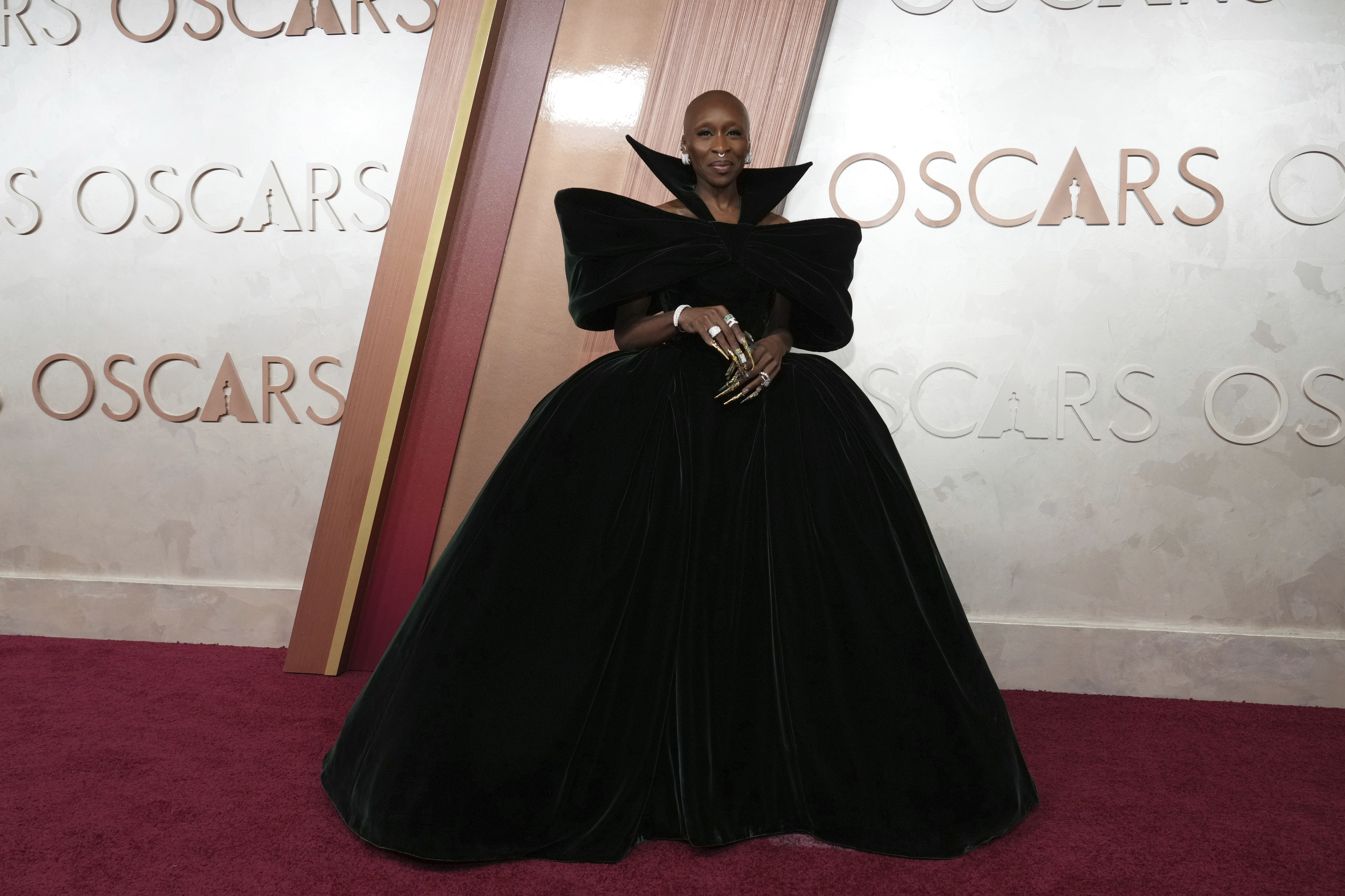 Ariana Grande goes full Glinda and other stars stun in bold red and classic black on Oscars carpet Ariana Grande goes full Glinda and other stars stun in bold red and classic black on Oscars carpet