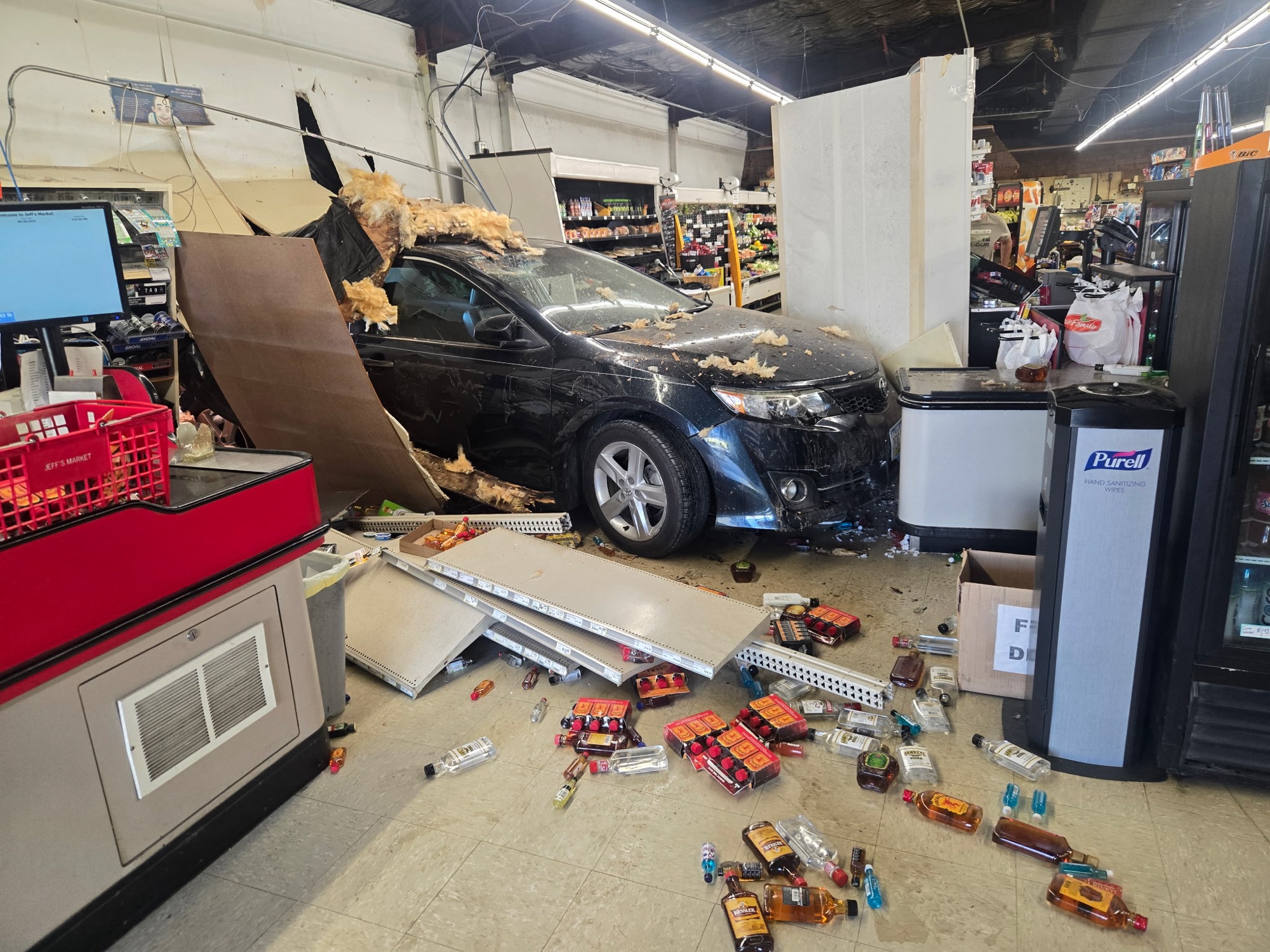 Car crashes through wall at Durant grocery store