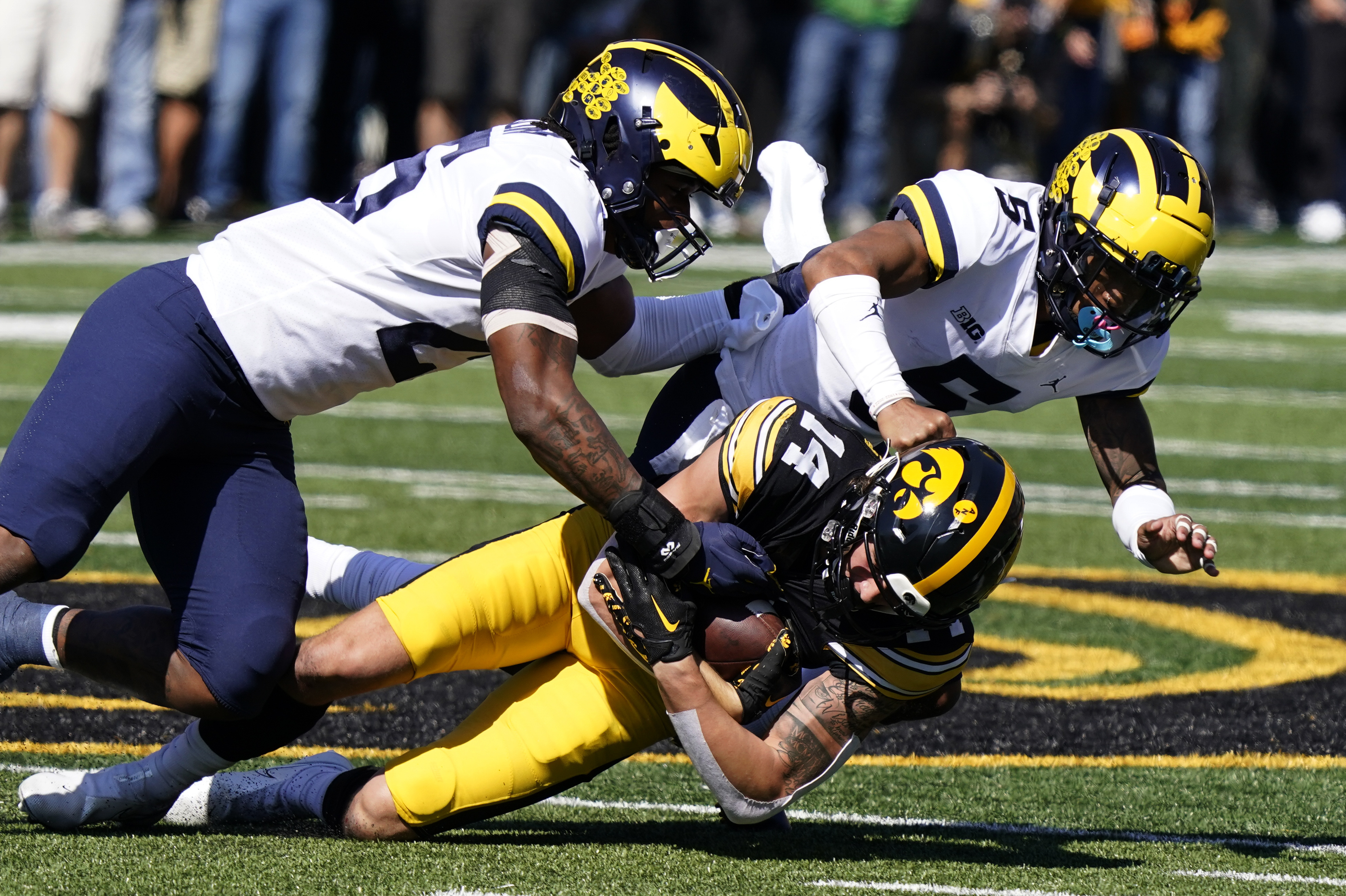 Corum McCarthy lead No. 4 Michigan past Iowa 27 14