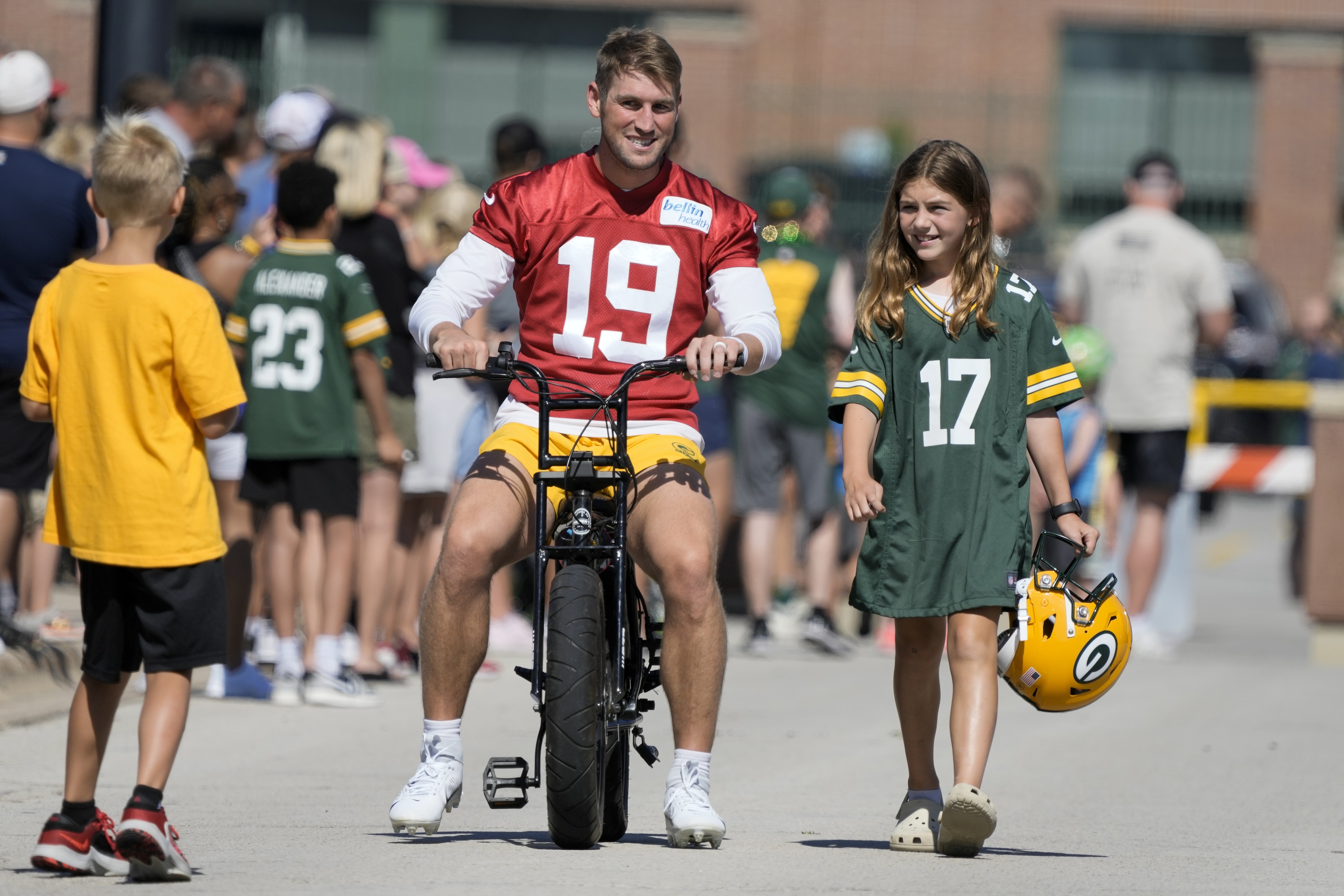 Green Bay Packers quarterback Danny Etling (19) runs for a