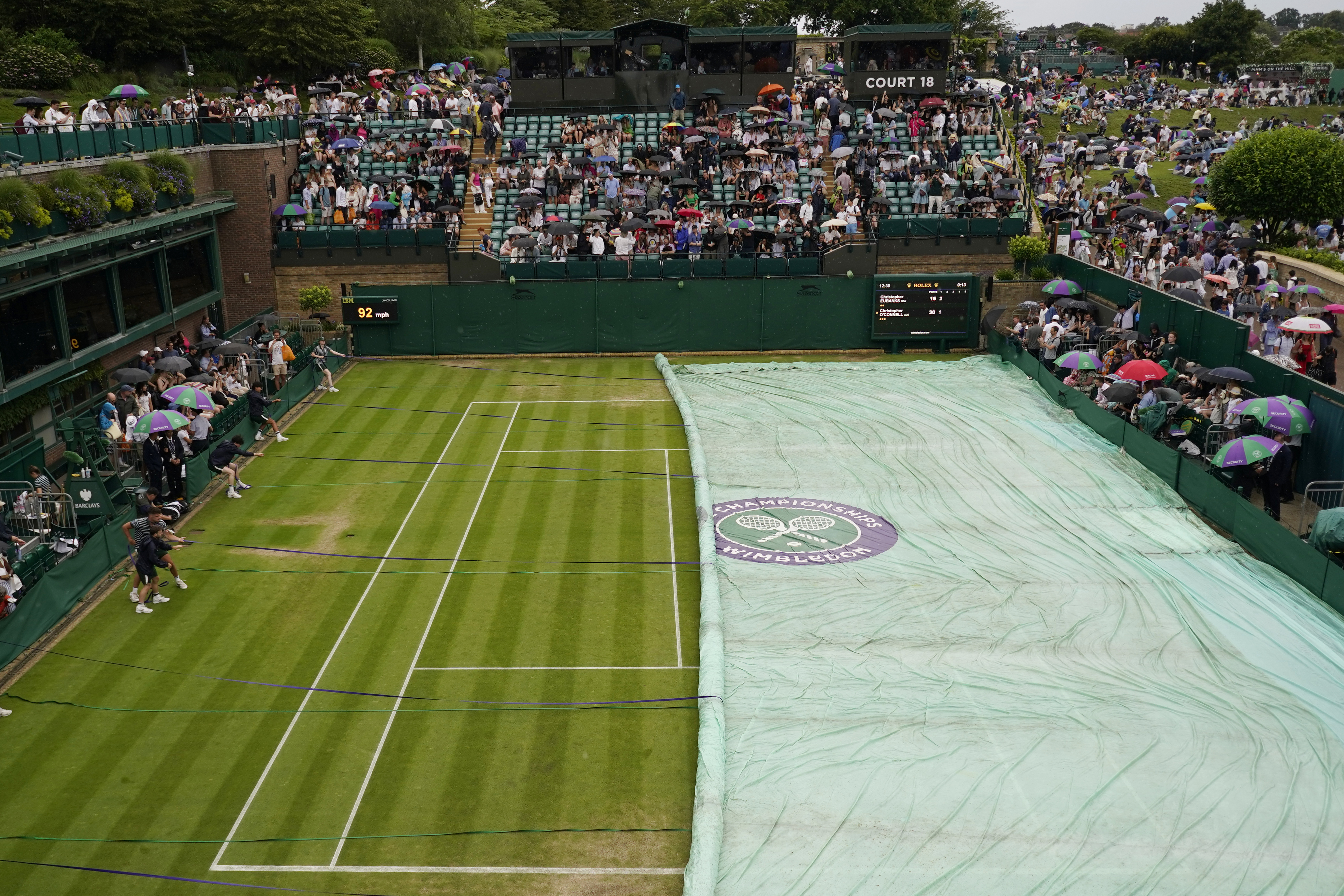 At rainy Wimbledon, Alcaraz among those playing day after day -- and winning