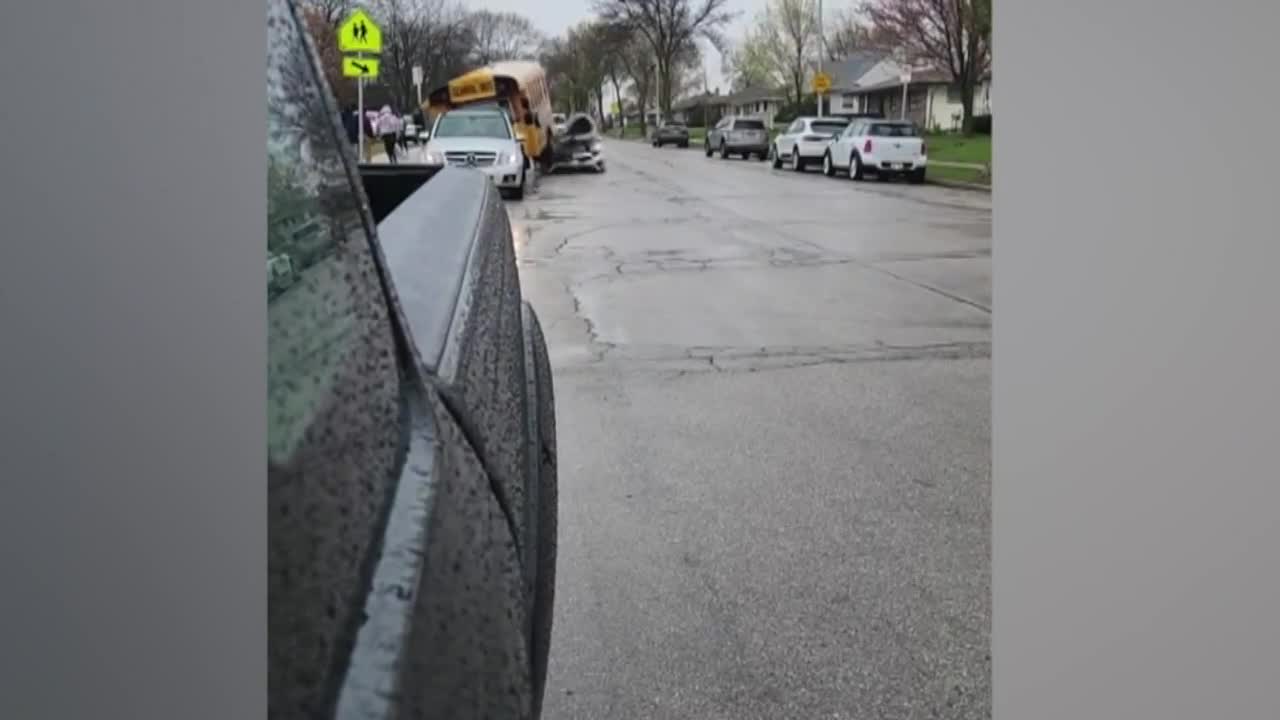 CAUGHT ON VIDEO: Vehicle crashes into school bus, hurting several people