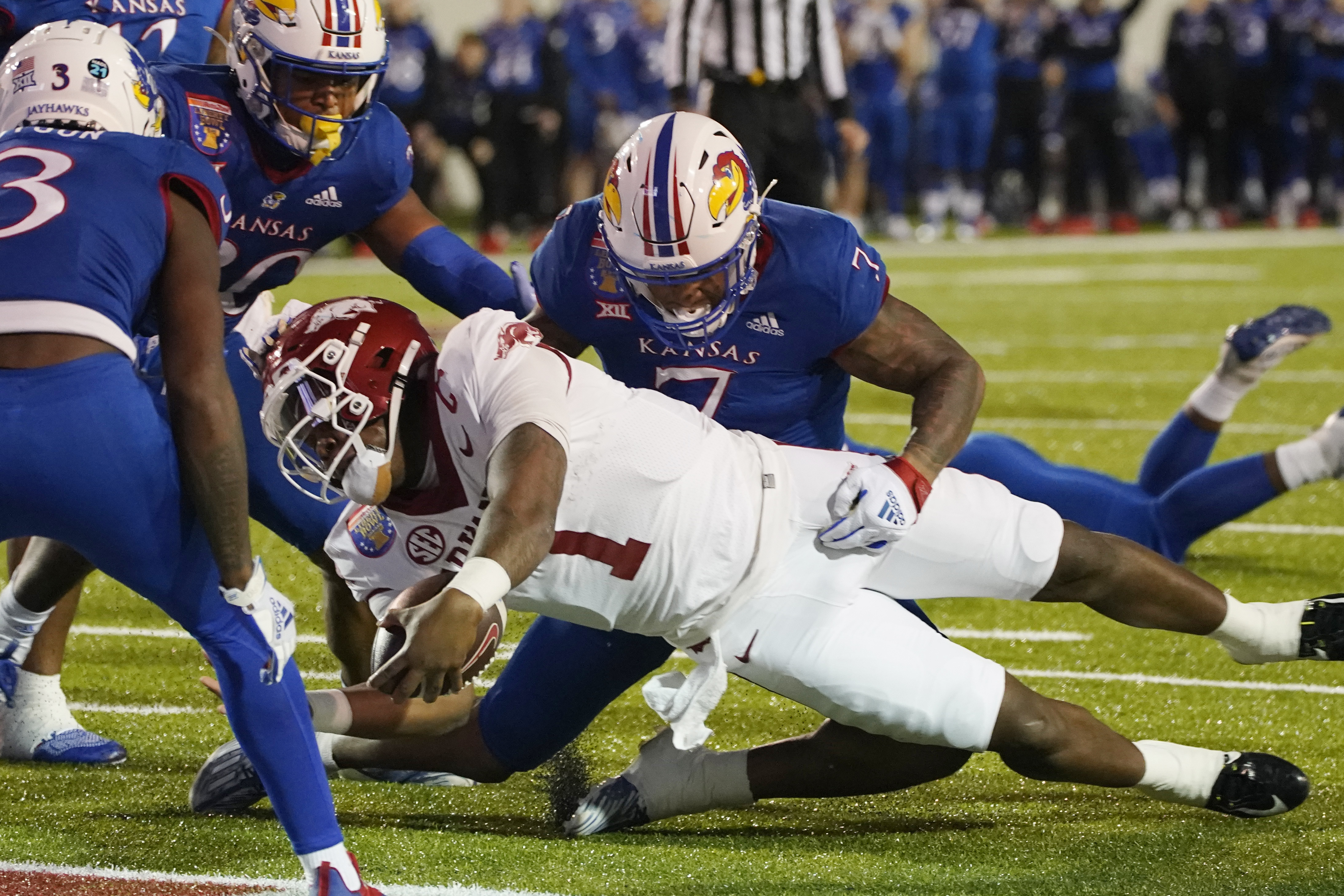 Arkansas defeats Kansas 55-53 in triple OT in highest-scoring AutoZone  Liberty Bowl ever