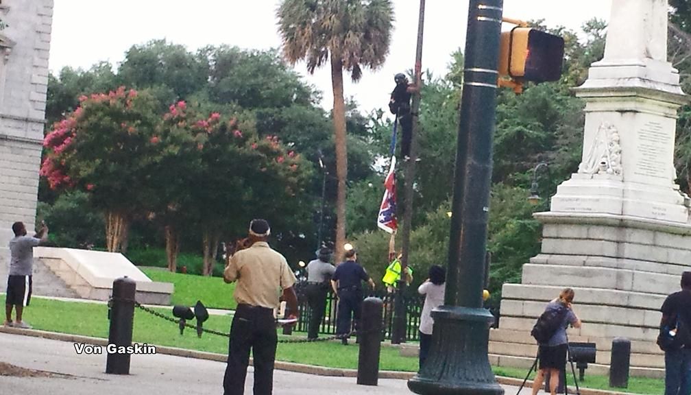 Bree Newsome Removing Confederate Flag From Flagpole Photo Hotsell ...