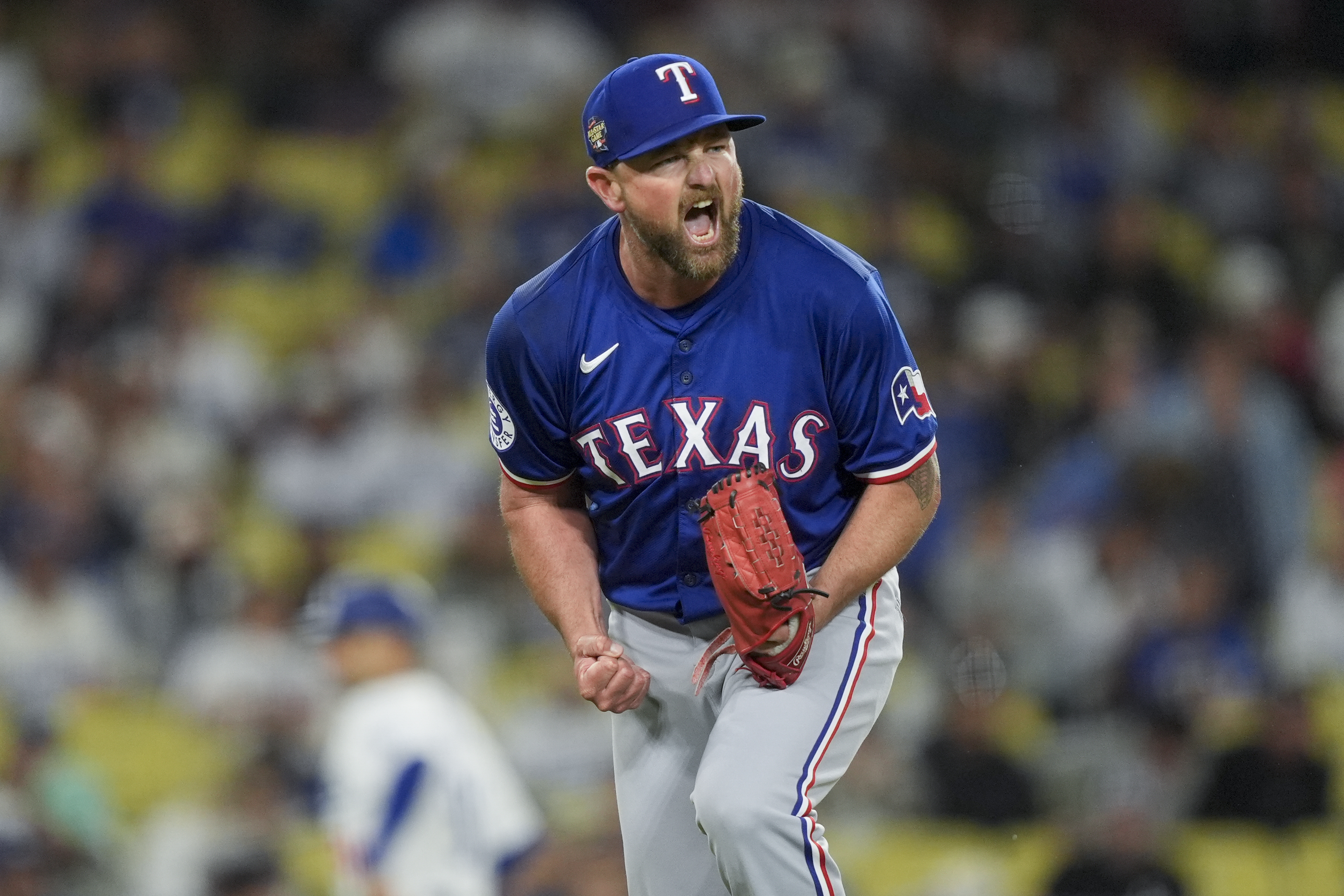 Lorenzen pitches Rangers past Dodgers 3-1 for their 1st series win