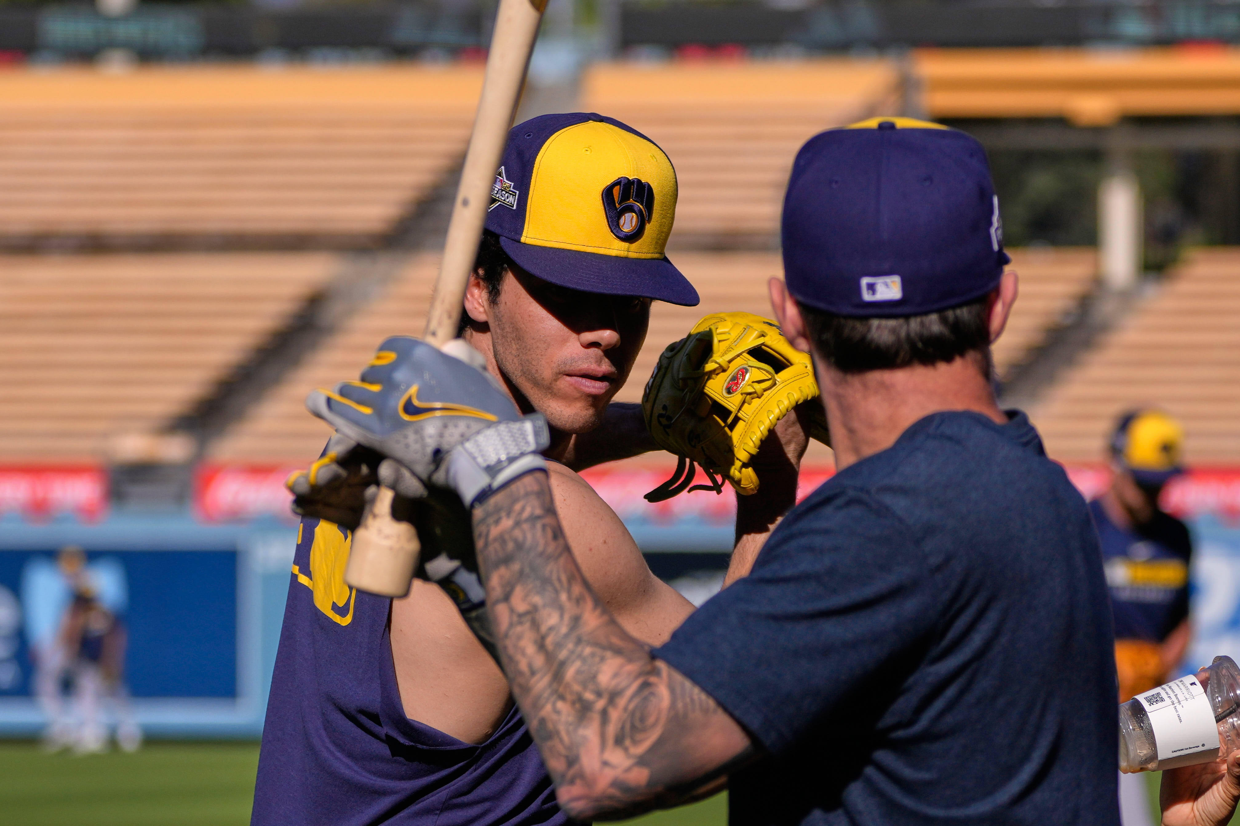 Yelich and Turang prepare before a postseason game Christian Yelich and Brice Turang taking batting practice before a previous Brewers postseason game