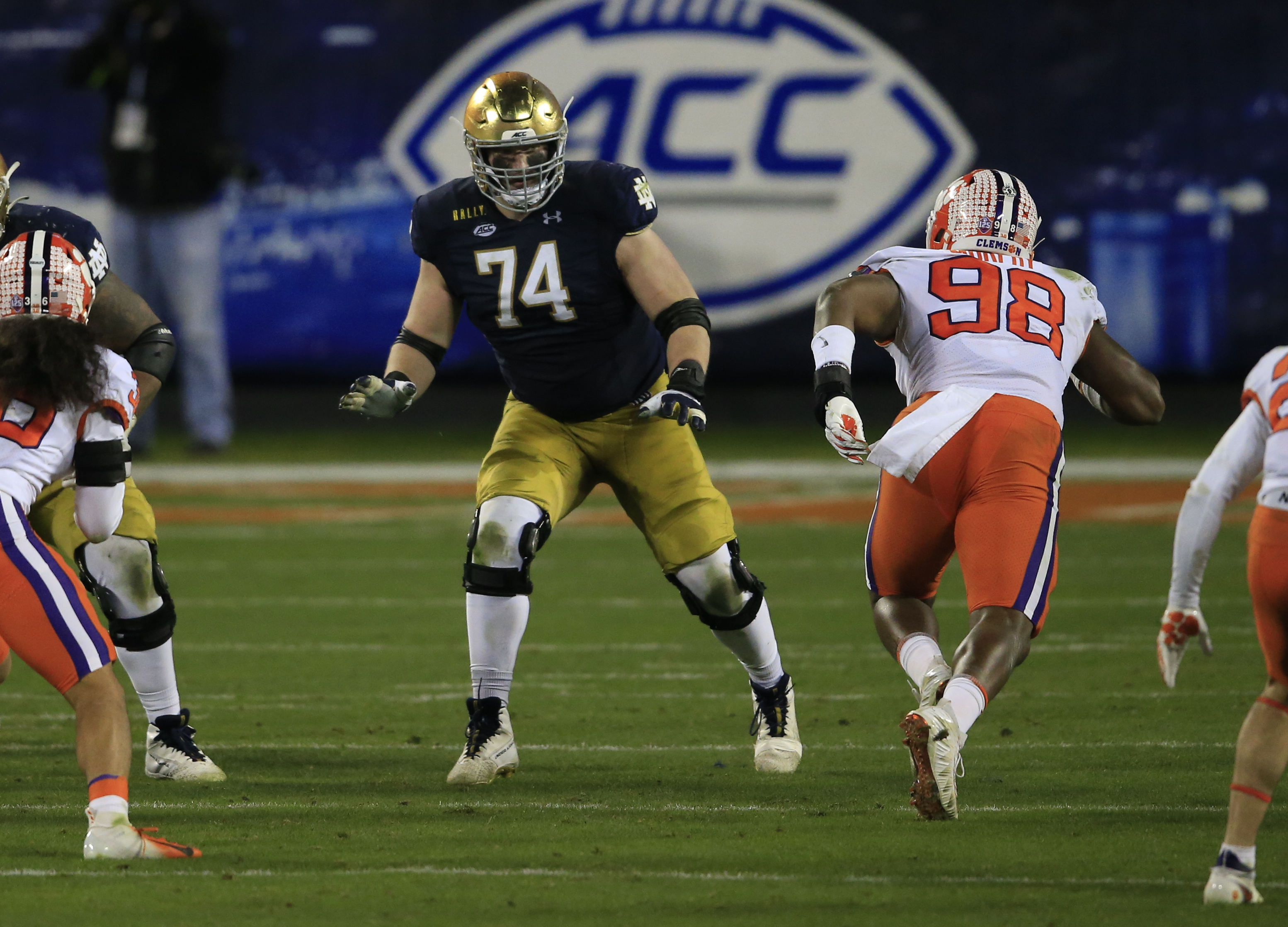 Miami Dolphins offensive tackle Liam Eichenberg (74) comes off the