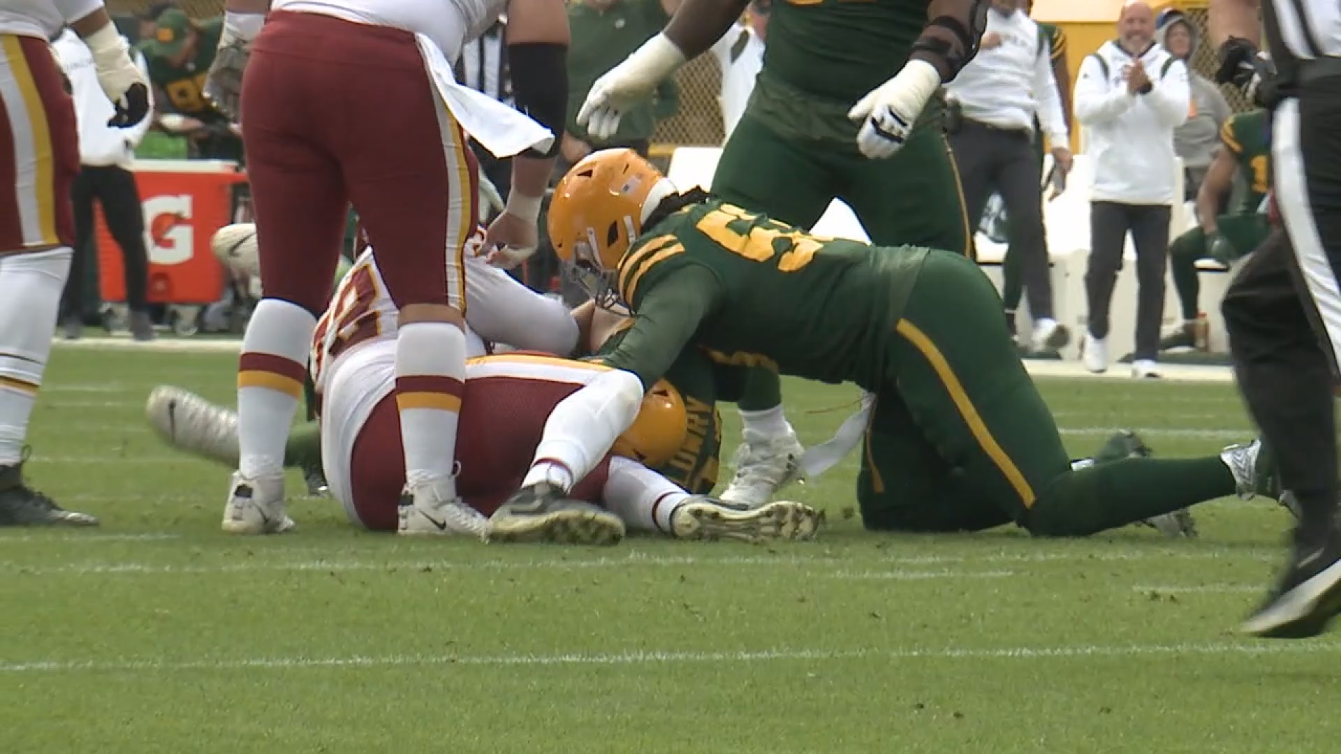 Green Bay Packers defensive end Dean Lowry (94) is blocked by Detroit Lions  offensive tackle Penei Sewell (58) during the first half of an NFL football  game Sunday, Nov. 6, 2022, in