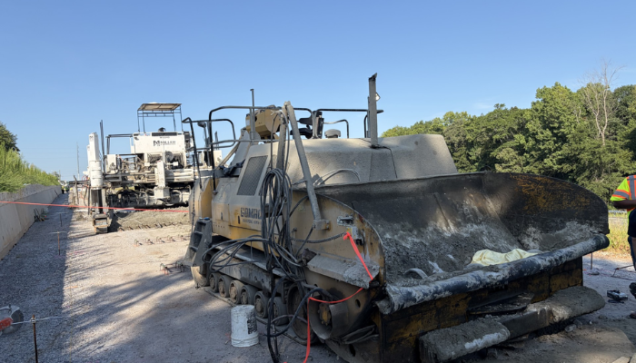Surgeons rushed to Athens construction site after worker falls into machine; rescue crews work over an hour to extricate him