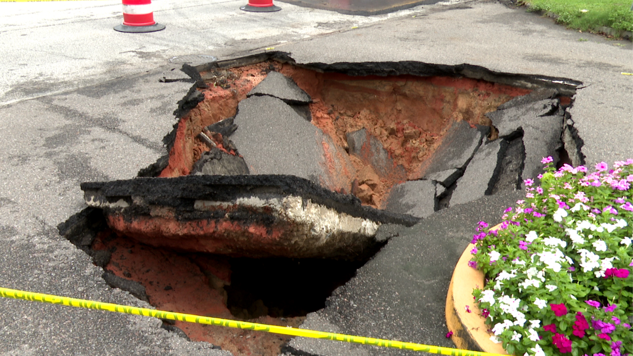 Neighbors shocked after giant sinkhole opens on Walton Way