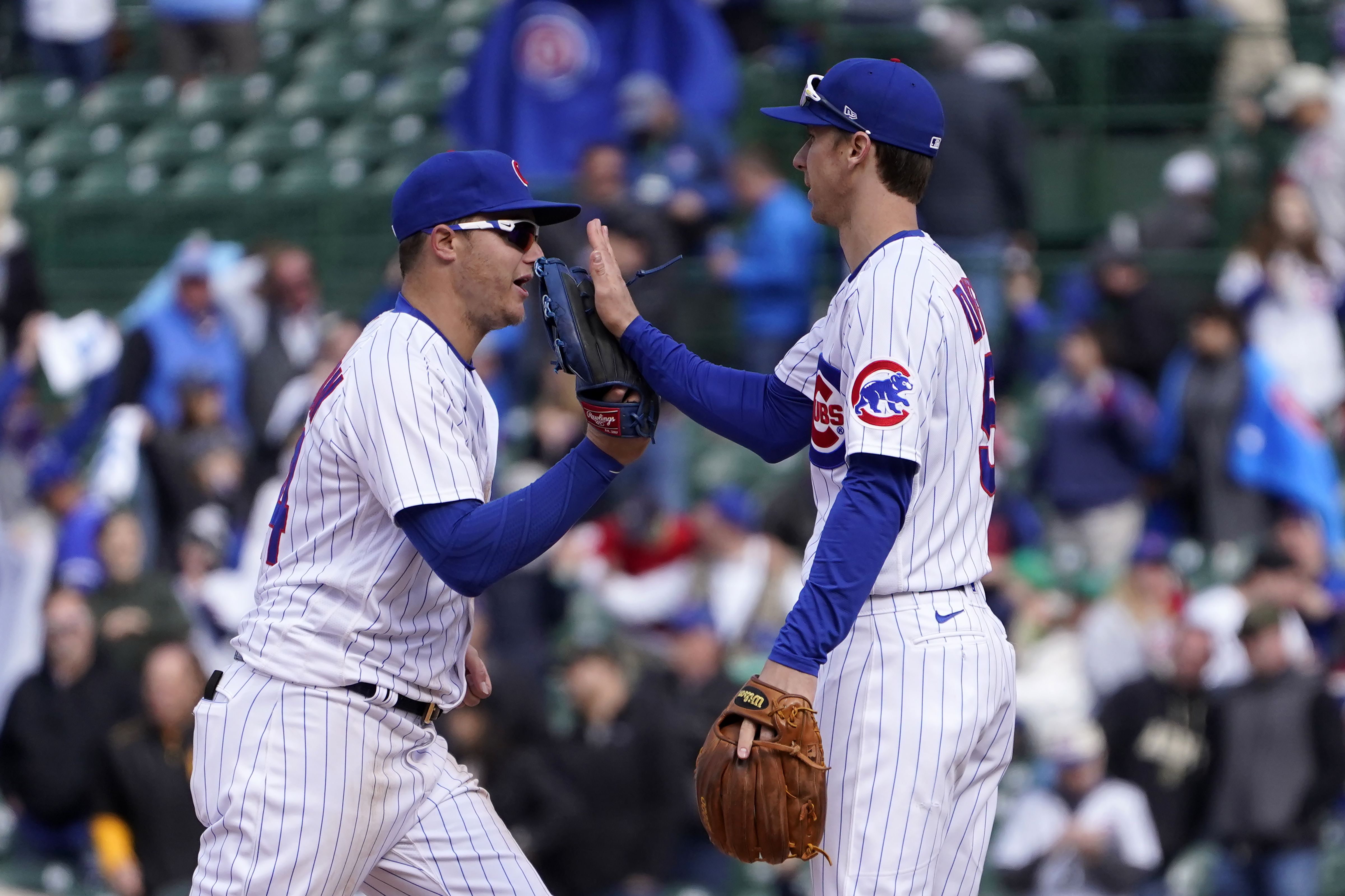 Davies, Pederson lead Cubs over Pirates 3-2, 4th win in row