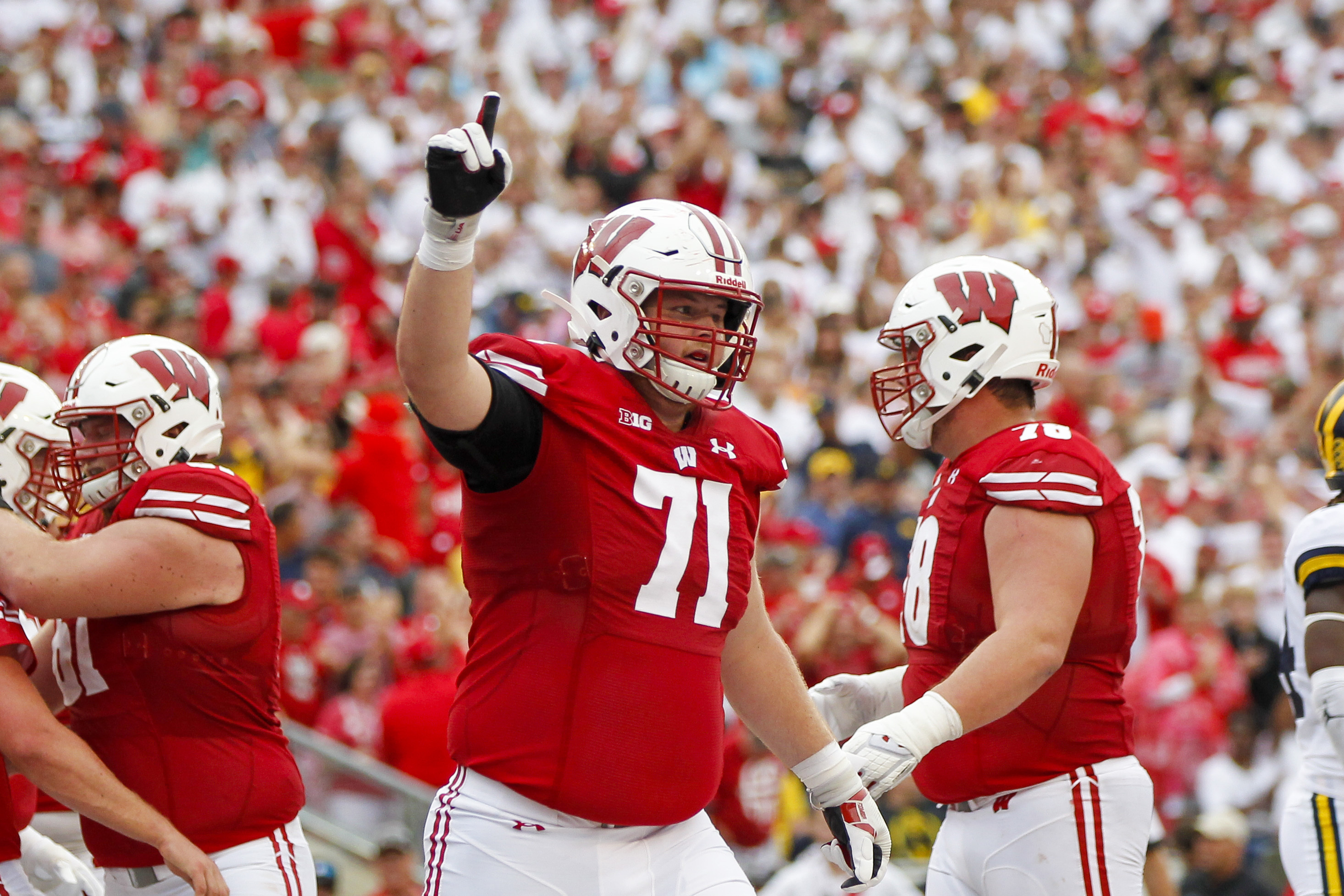 Badgers OL, Green Bay native Van Lanen chosen by Packers Wisconsin News -  Bally Sports