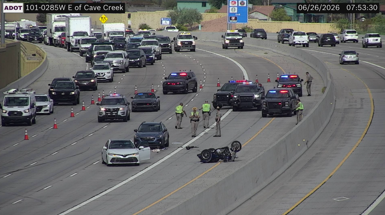 Motorcycle crash blocks lanes during morning commute on Loop 101