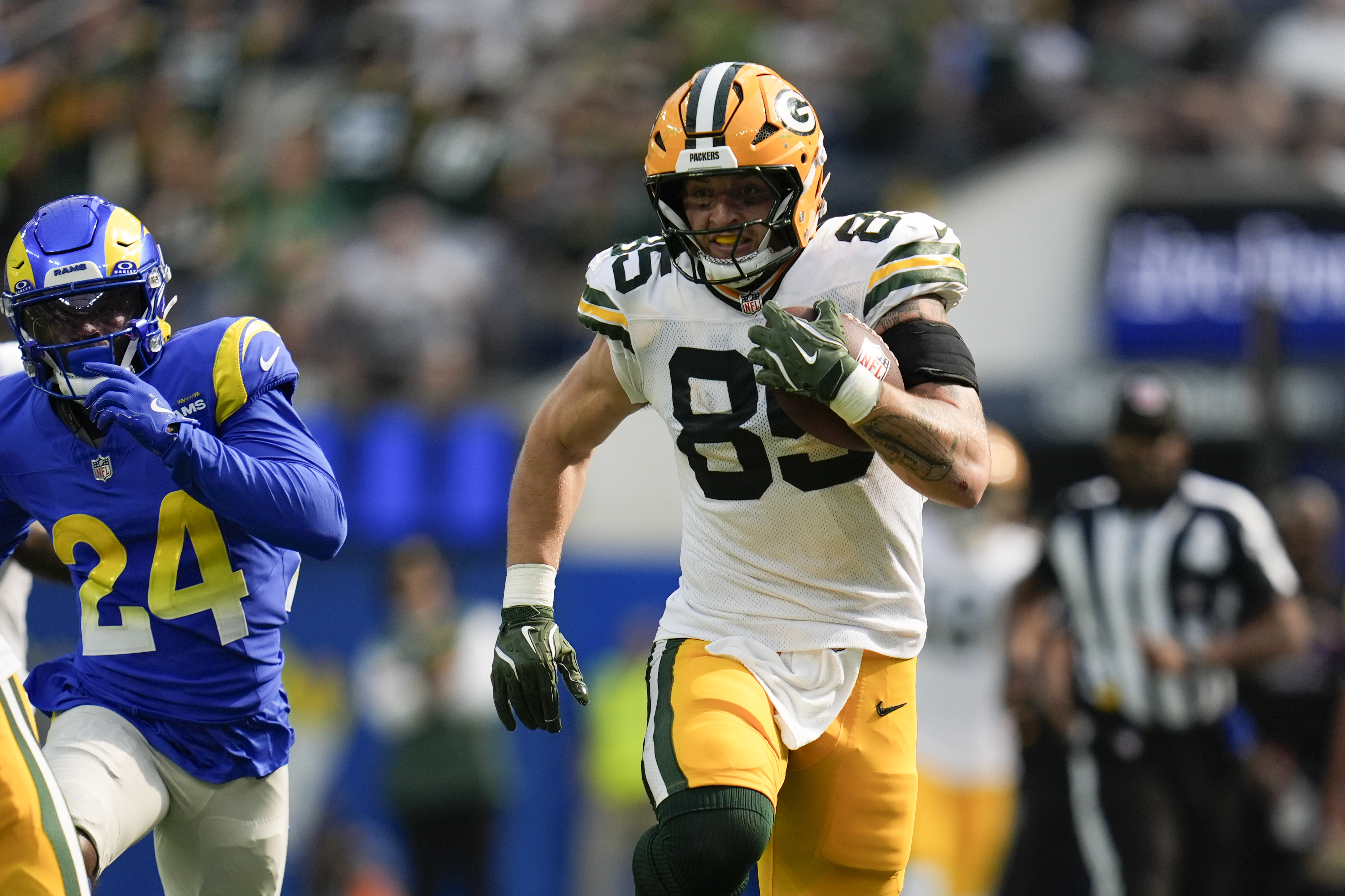 Jordan Love throws a pair of TD passes in the second half to rally