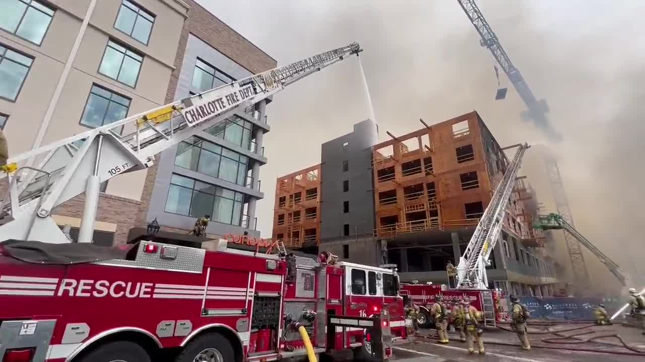 What building in burning in SouthPark in Charlotte, NC?