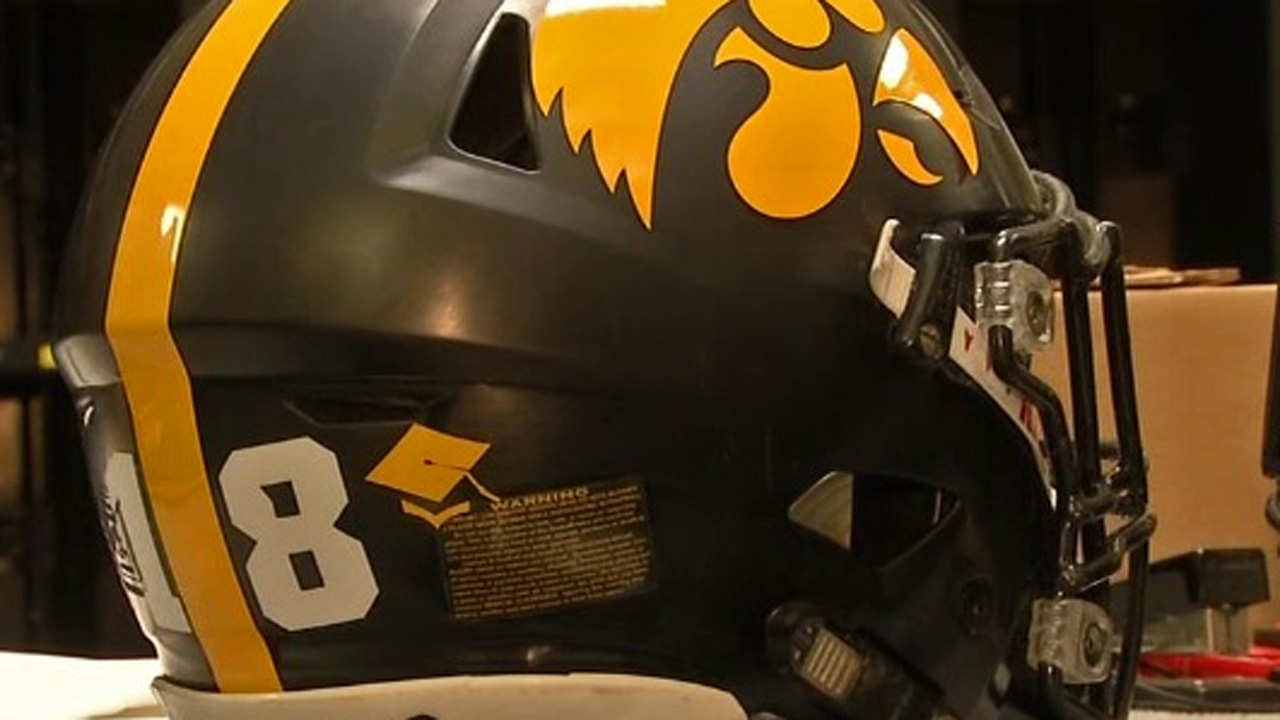 Any idea what the stickers represent on Michigan Football helmets