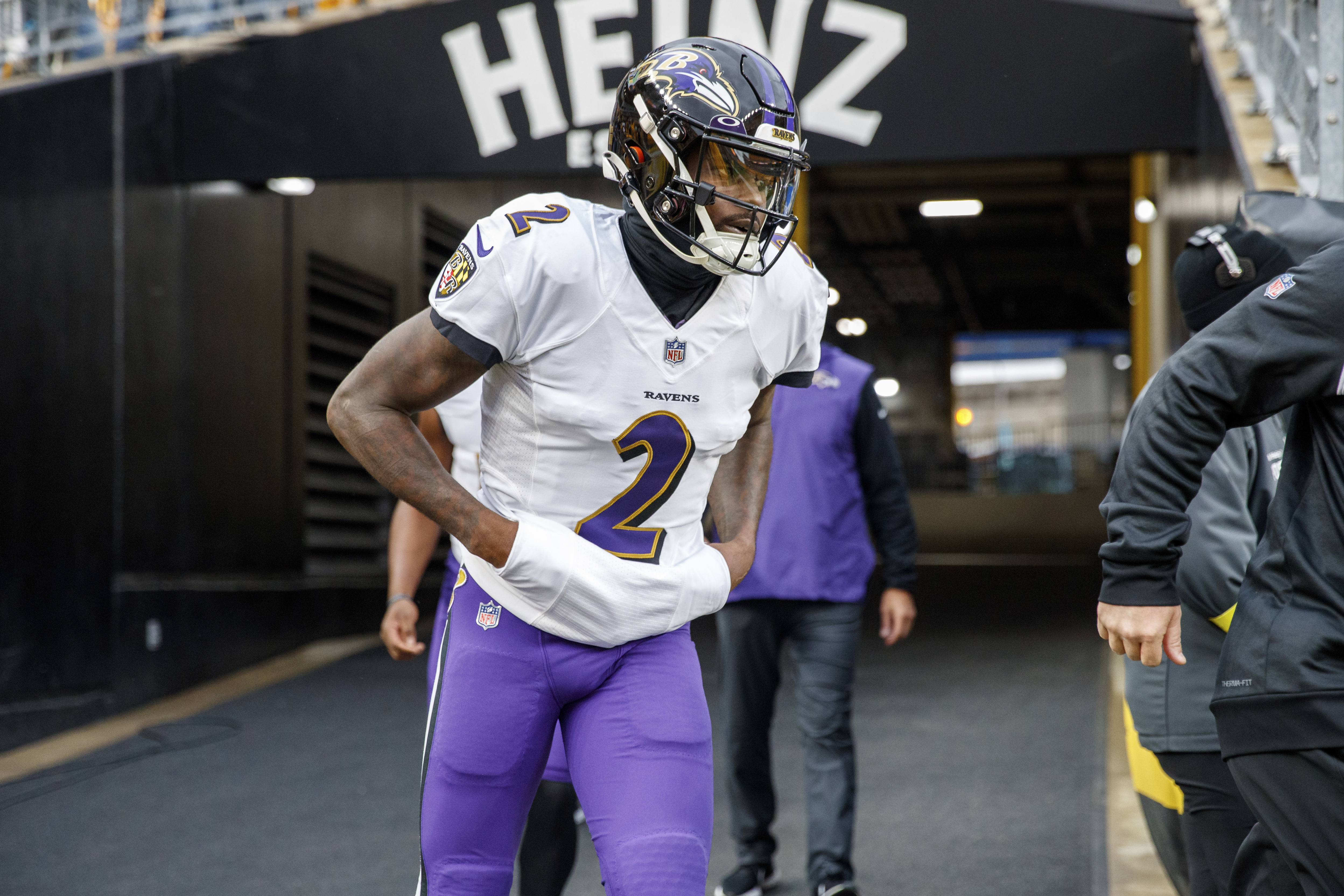 Quarterback Tyler Huntley of the Baltimore Ravens runs with the