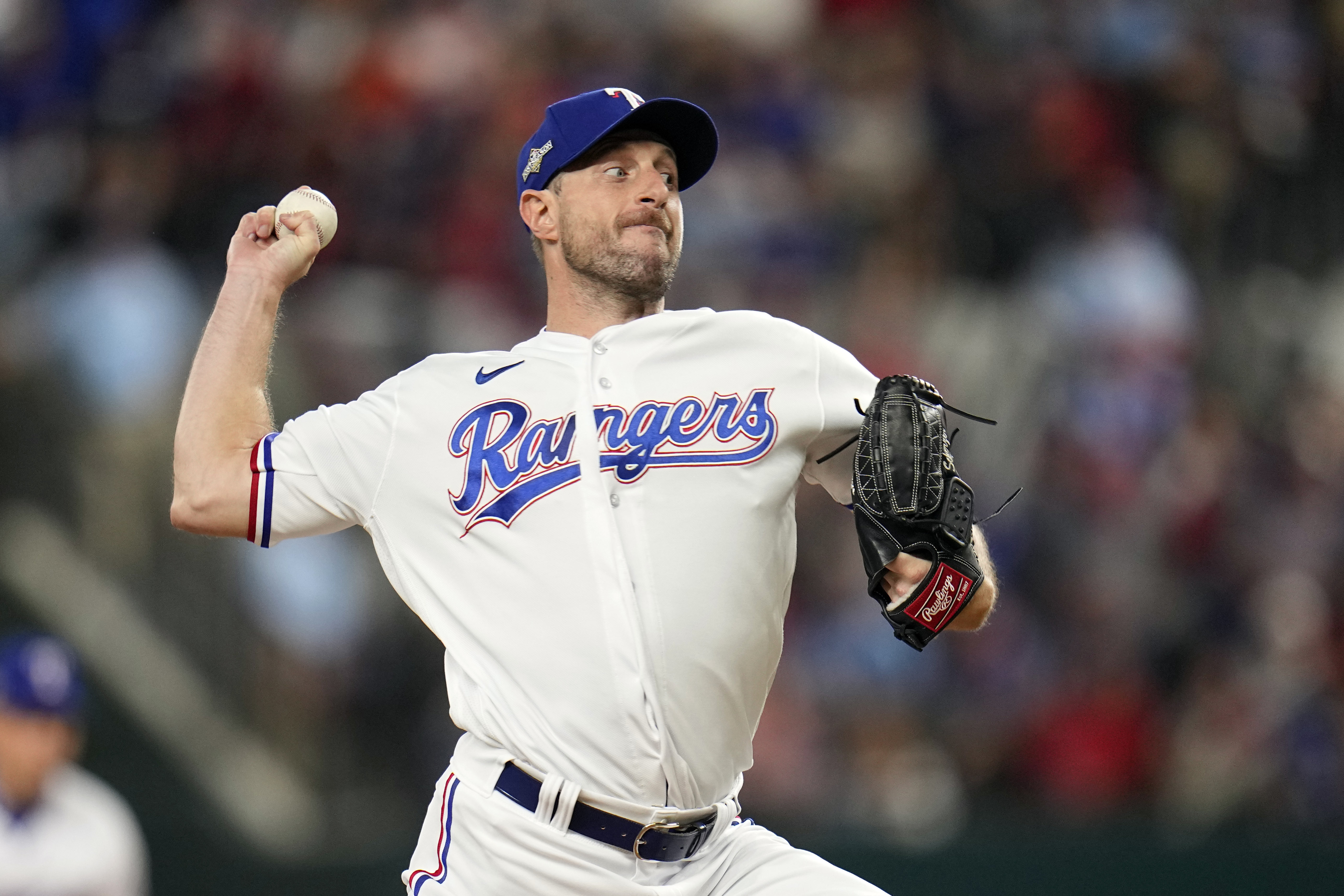 Mets' Max Scherzer gets bitten by one of his dogs on pitching hand
