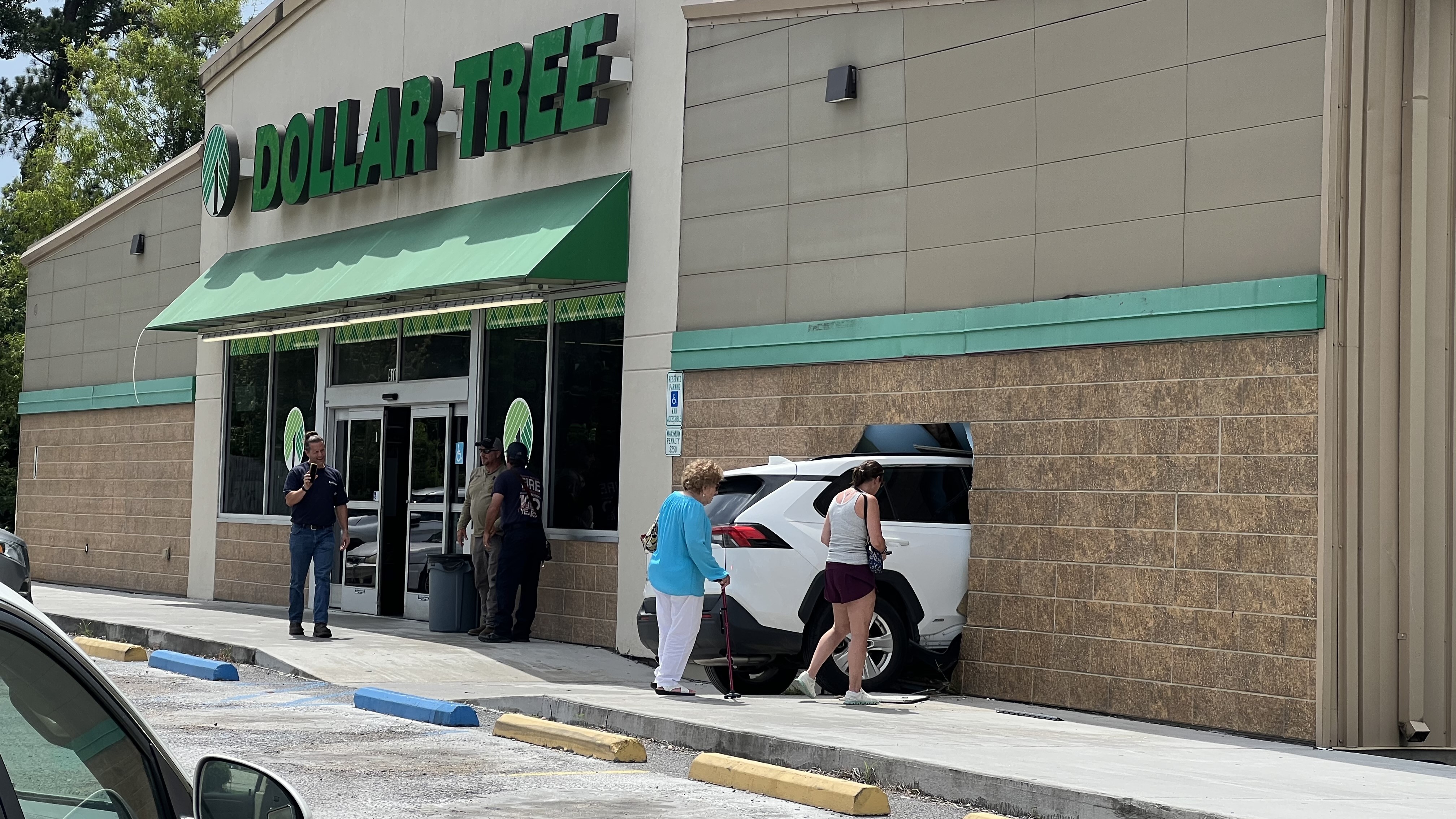 Car crashes into Dollar Tree on Greenwell Springs Road