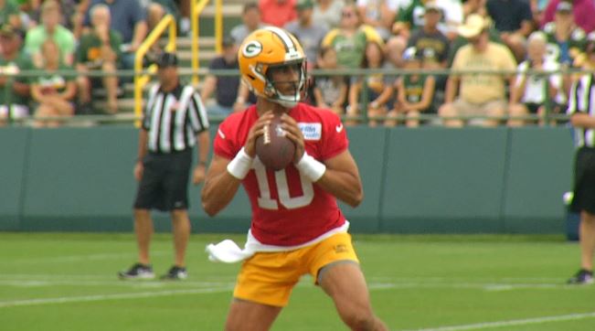 Love got text from Rodgers before 1st training camp as Packers