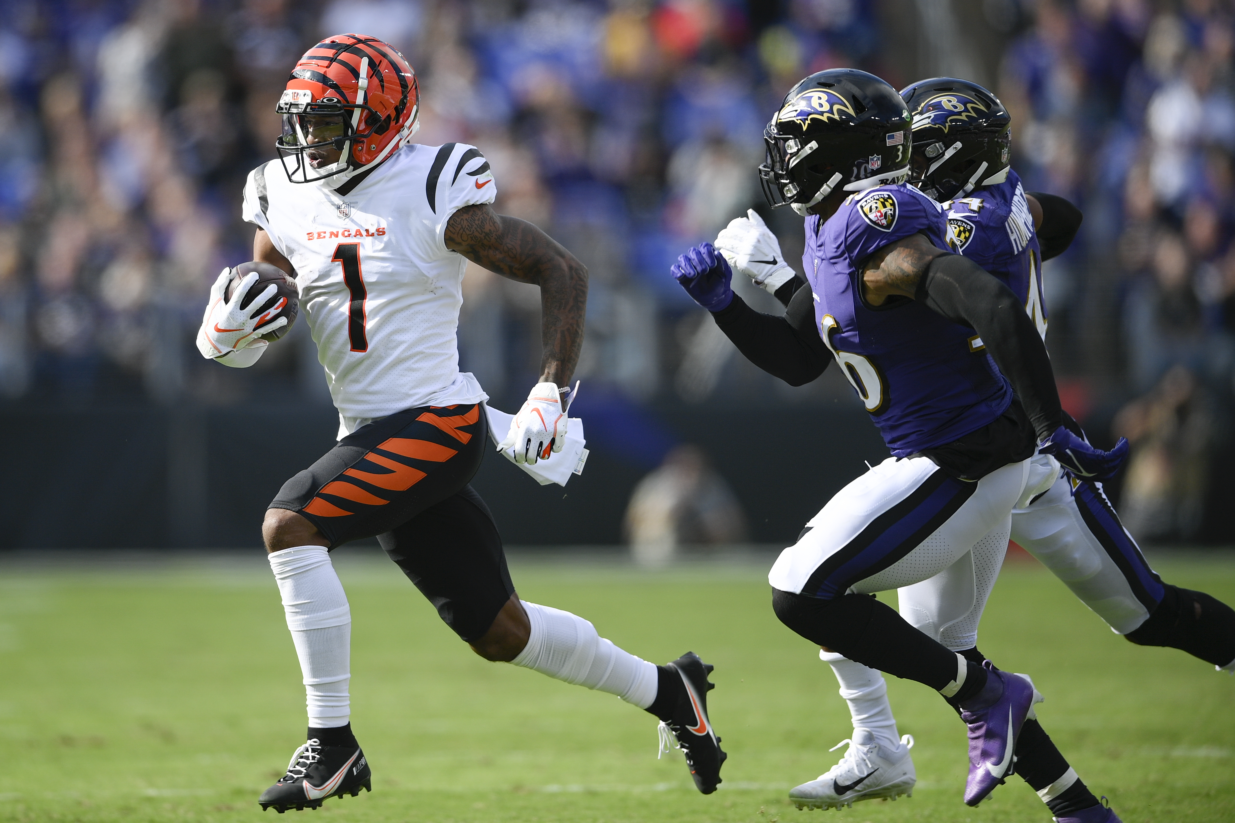 Baltimore Ravens safety Chuck Clark (36) and cornerback Marlon