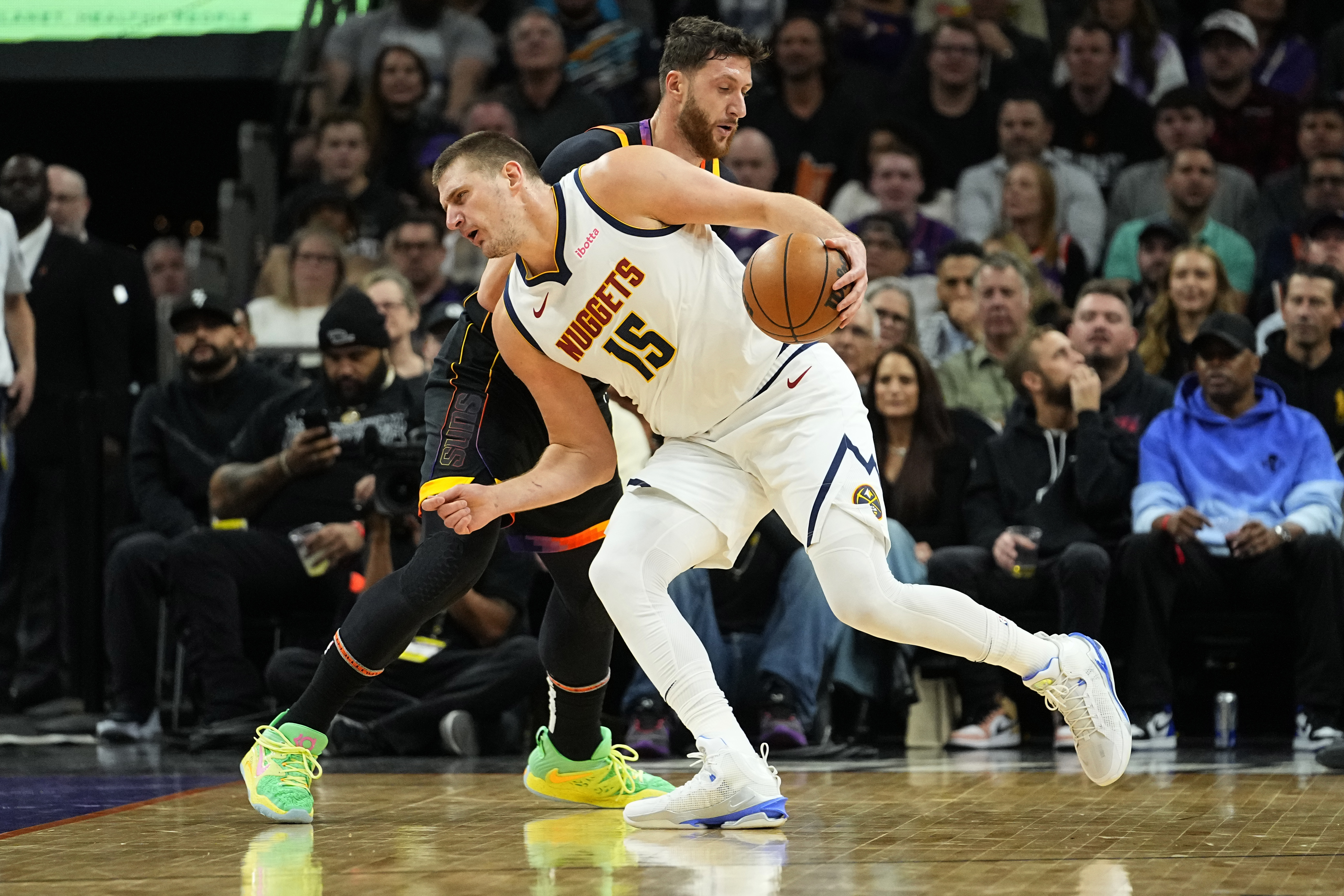 Nikola Jokic has 21 points, 16 assists, Nuggets hold off Suns 119-111