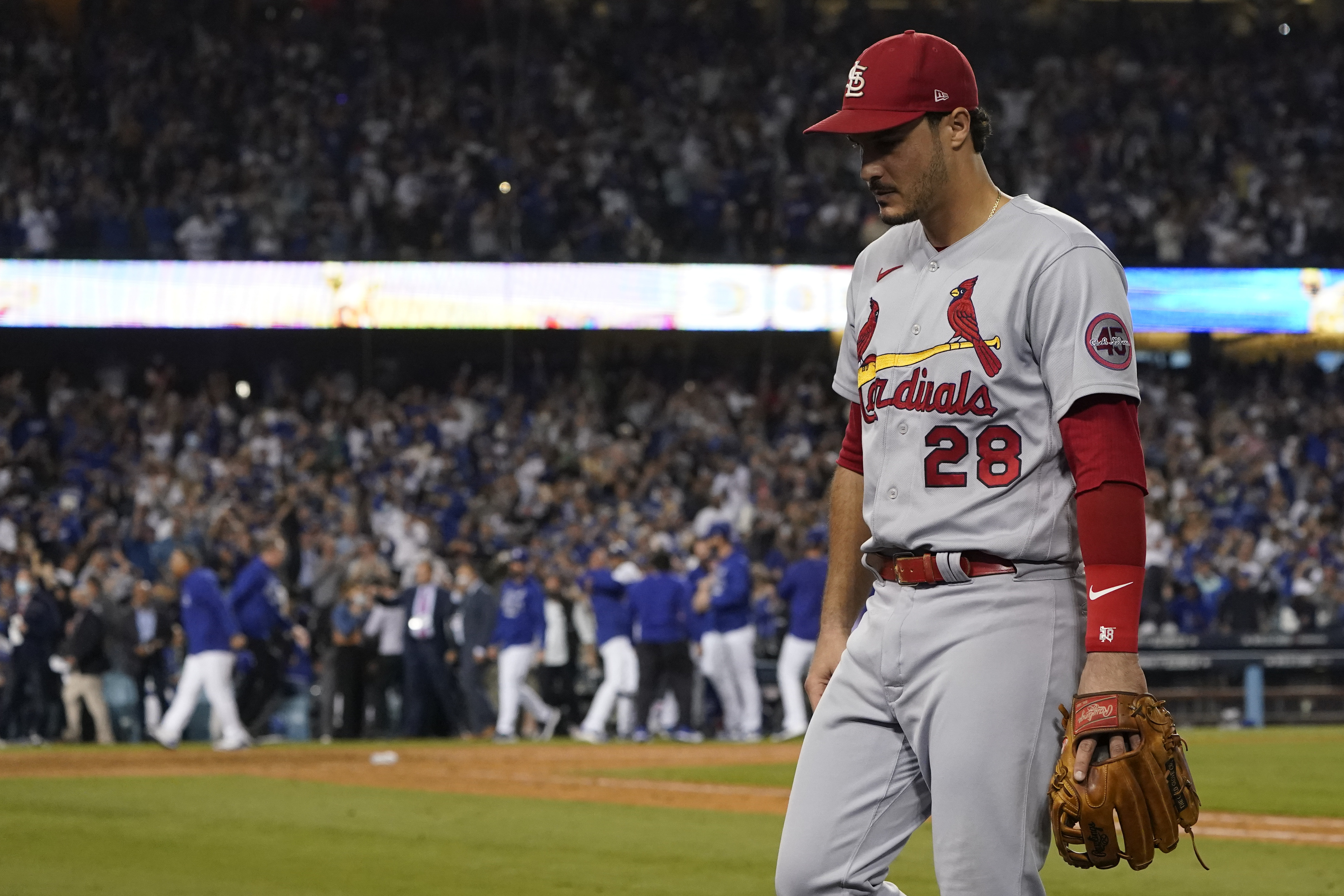 Tommy Edman and Adam Wainwright react after NL wild card game