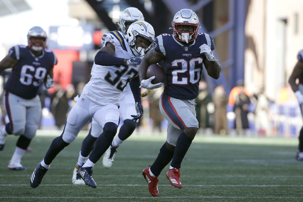 New England Patriots guard Shaq Mason (69) warms up before an NFL