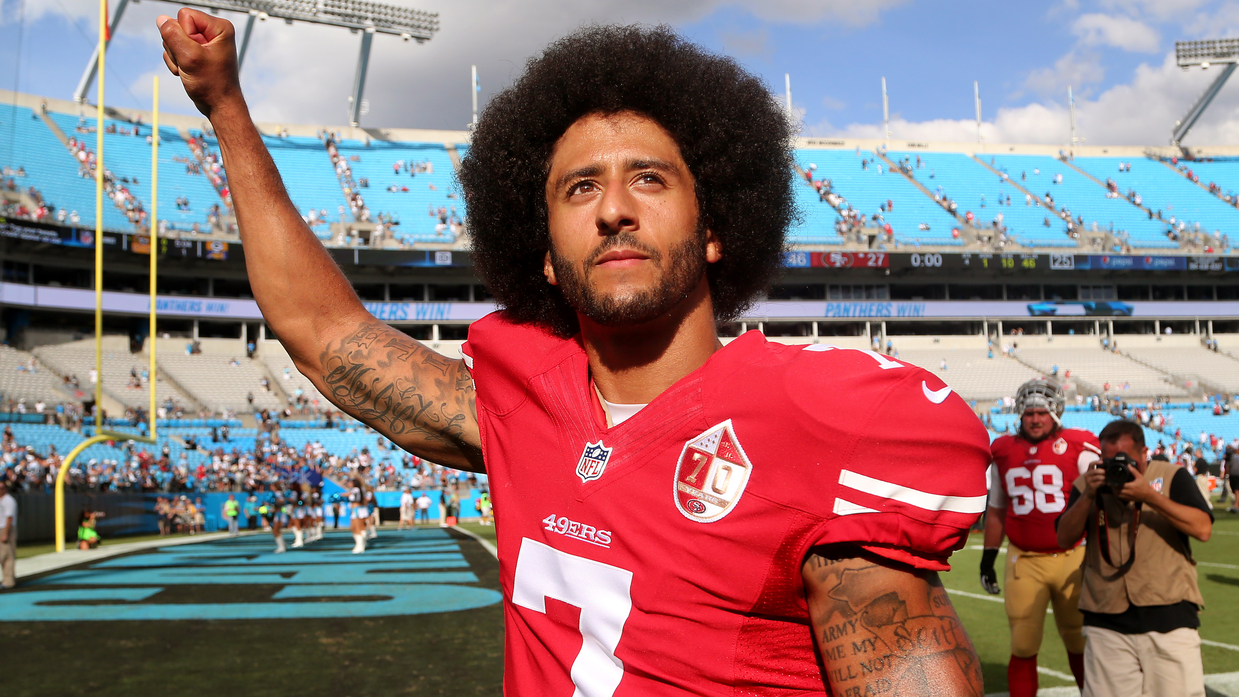 Colin Kaepernick is standing up to the National Football League