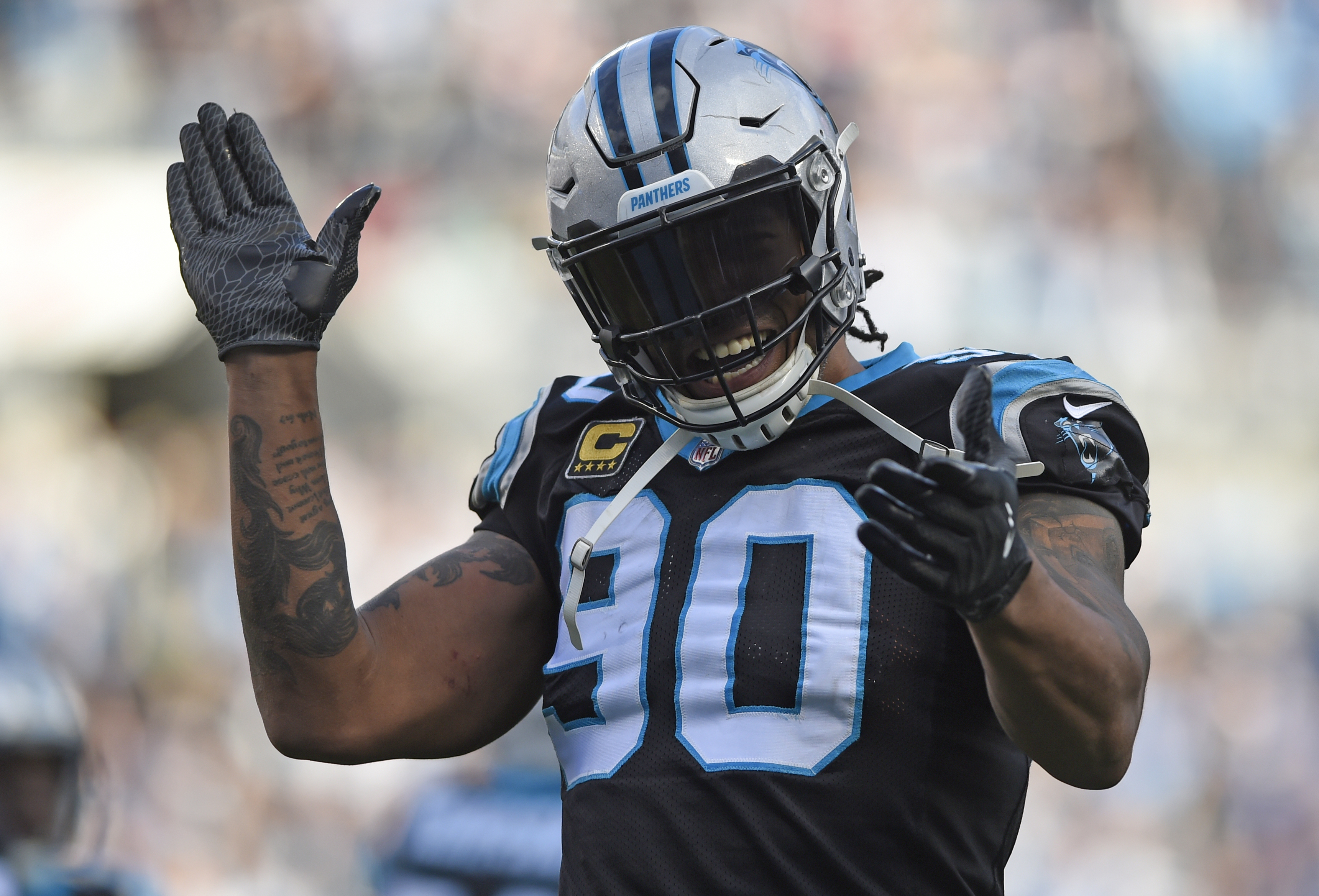 Carolina Panthers inducting Julius Peppers, Muhsin Muhammad into