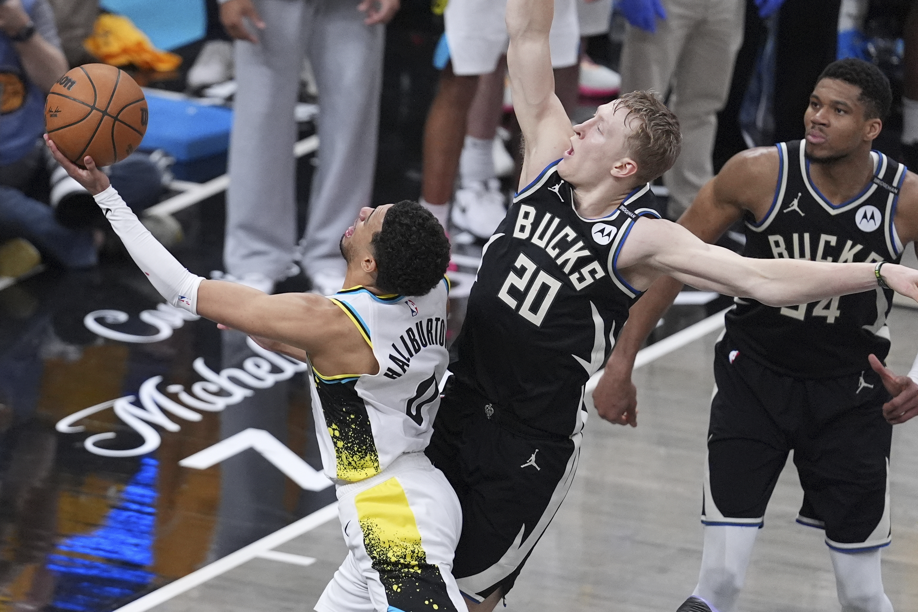Bucks squander late overtime lead, eliminated from playoffs