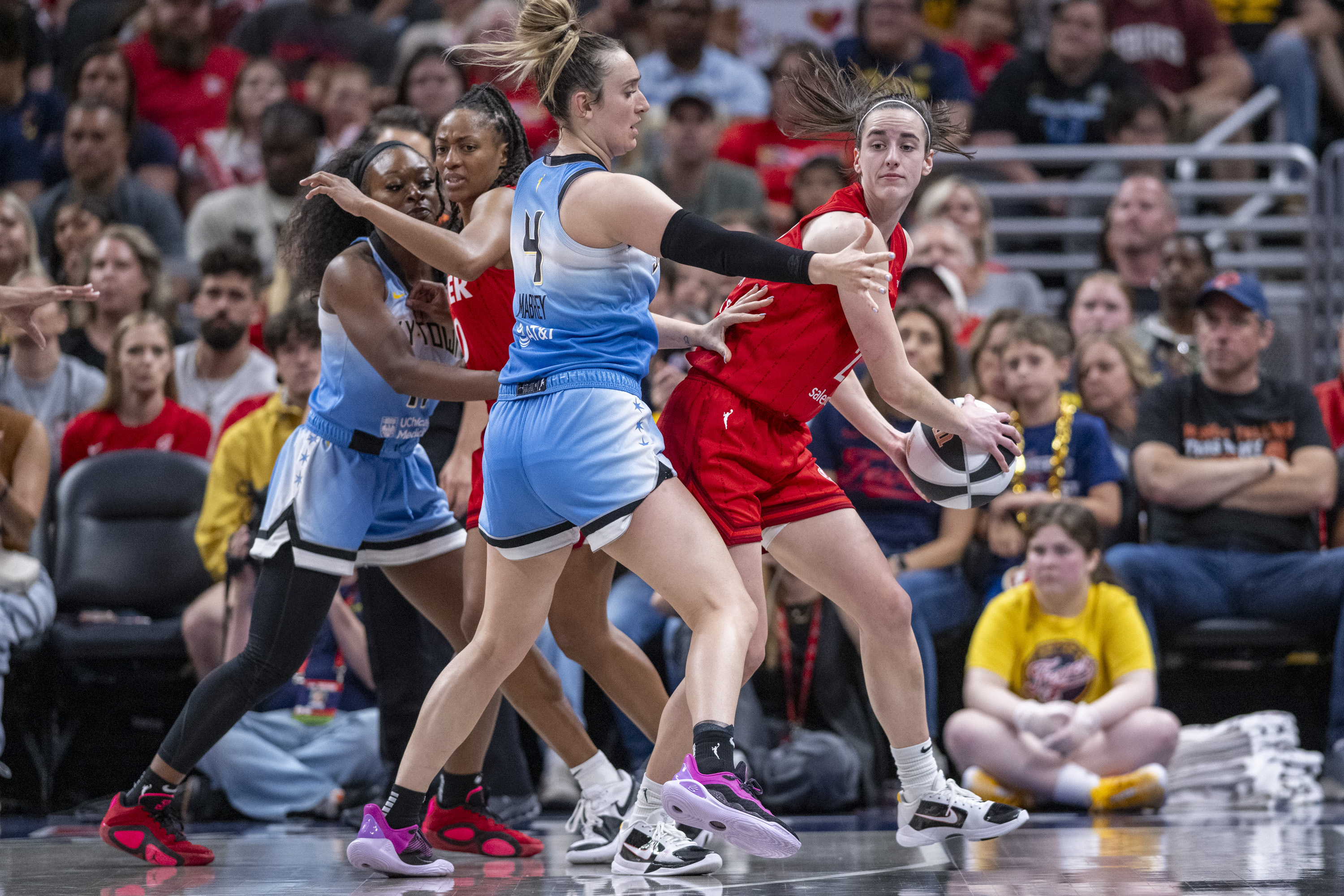 WNBA upgrades foul on Caitlin Clark by Chennedy Carter, fines Angel Reese  for no postgame interview