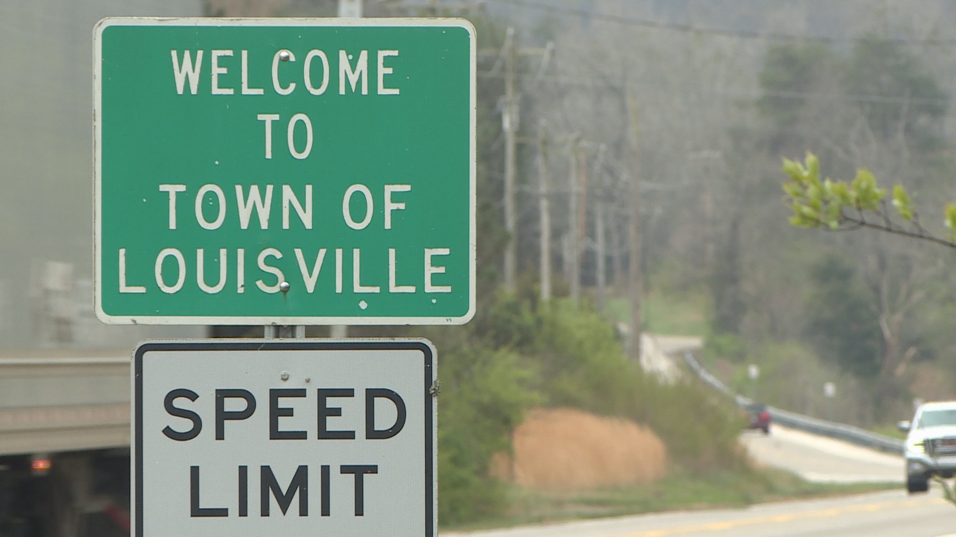 Louisville City Limit Sign, US Hwy 221 west of Louisville.