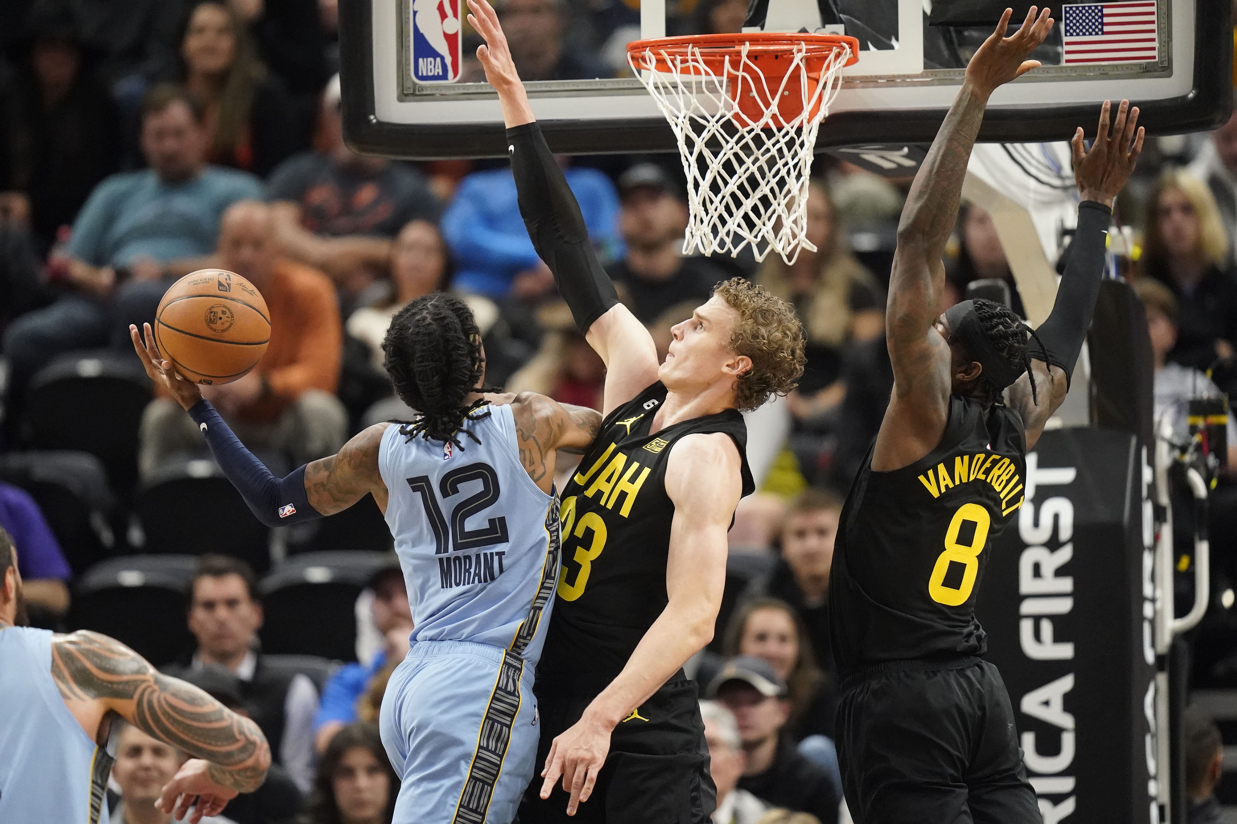 Jazz rout Grizzlies 121-105, improve to 4-0 at home