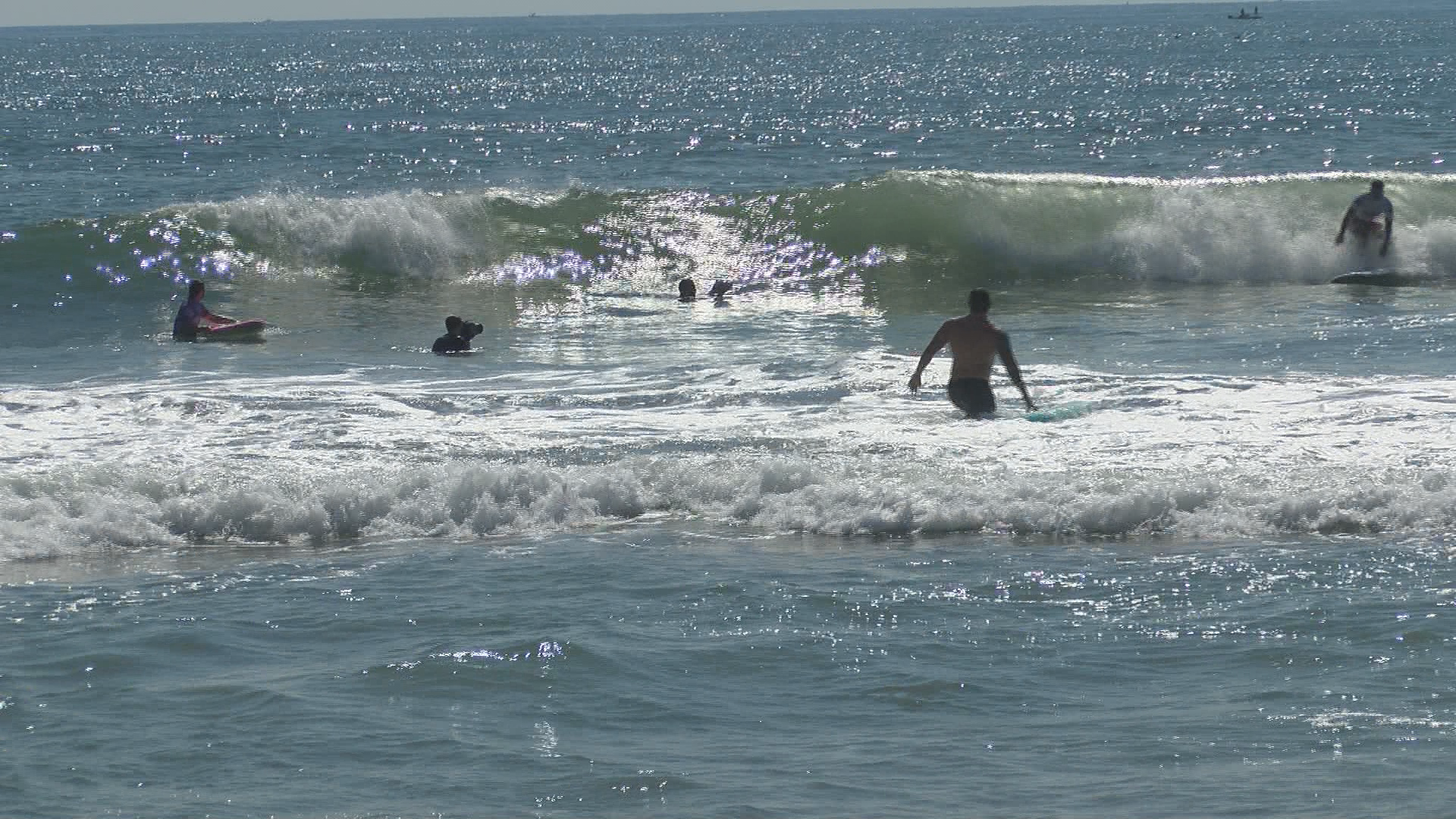 Surfing event at Wrightsville Beach brings young athletes and professionals together