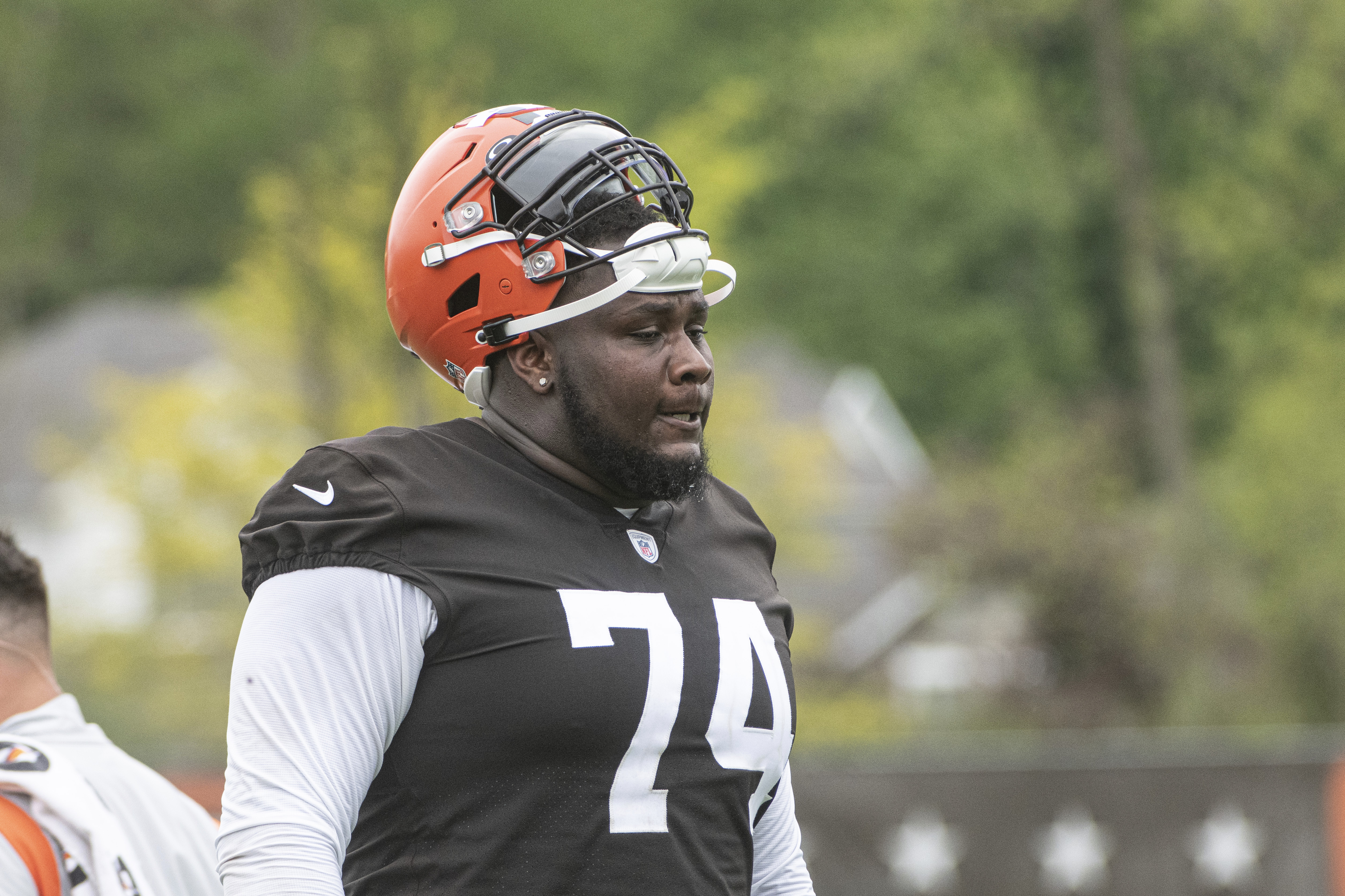 Cleveland Browns offensive tackle Dawand Jones (79) looks on