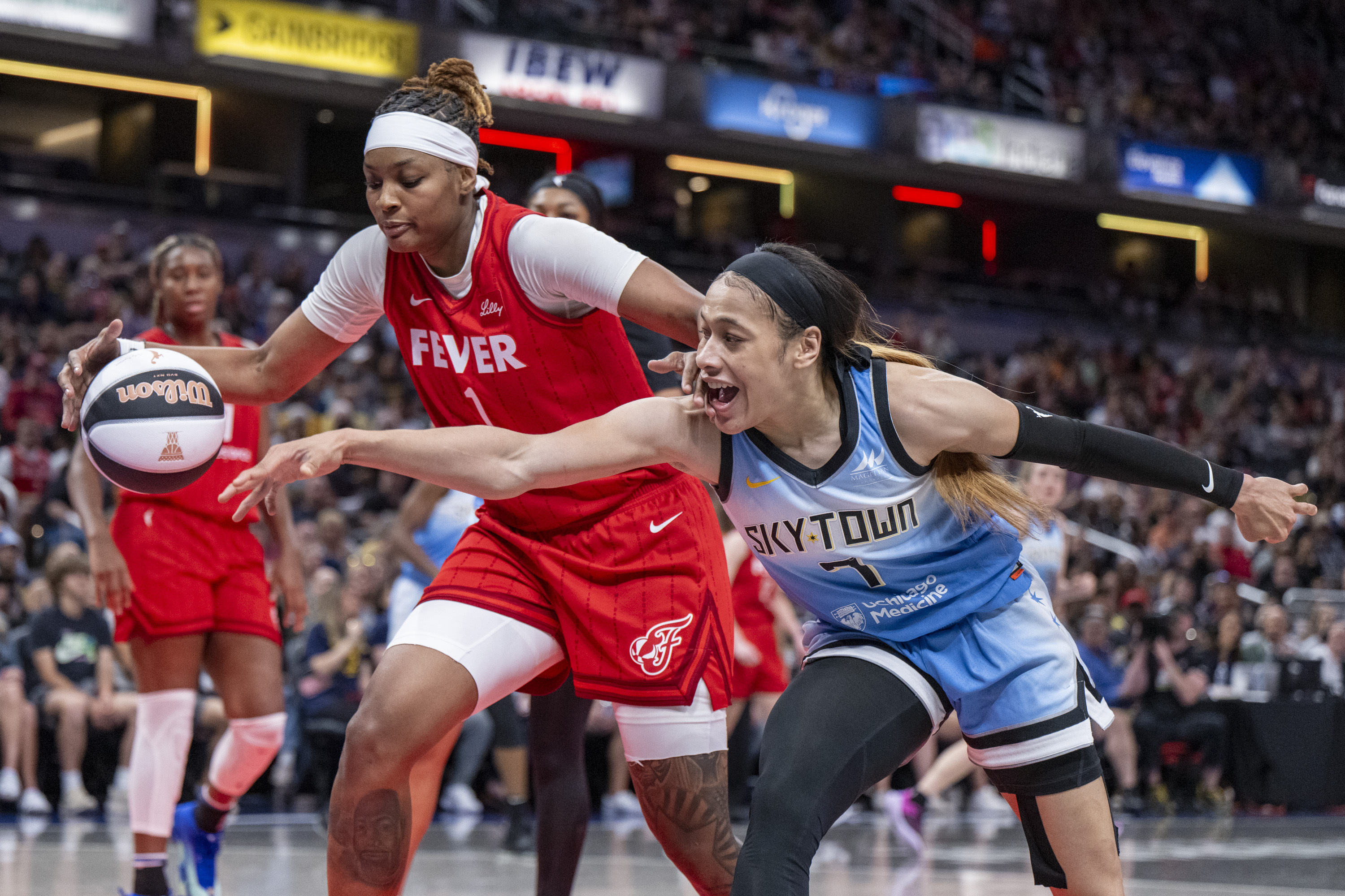 WNBA upgrades foul on Caitlin Clark by Chennedy Carter, fines Angel Reese  for no postgame interview