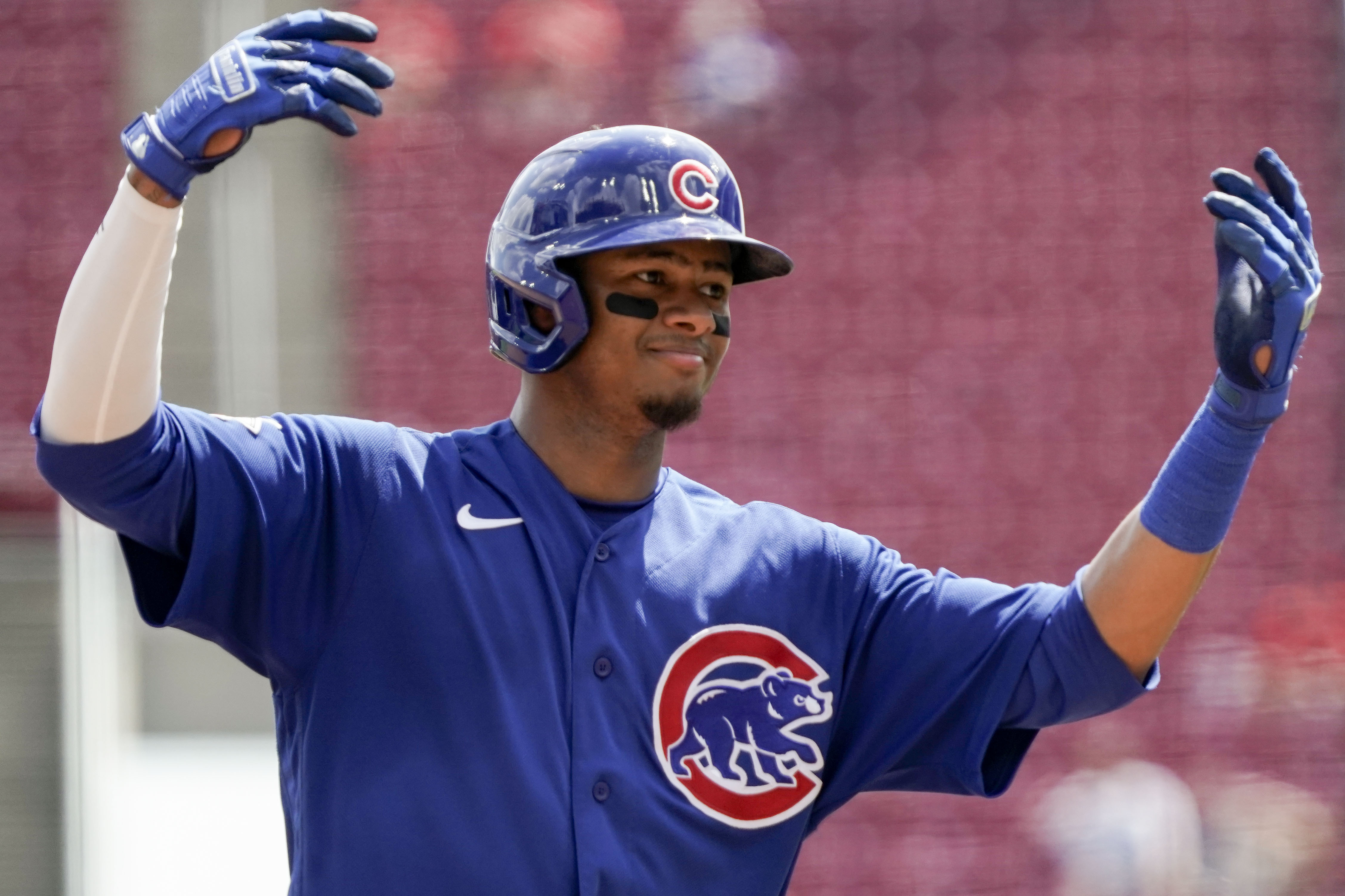 Depleted Cubs quiet playoff-contending Reds again, win 7-1