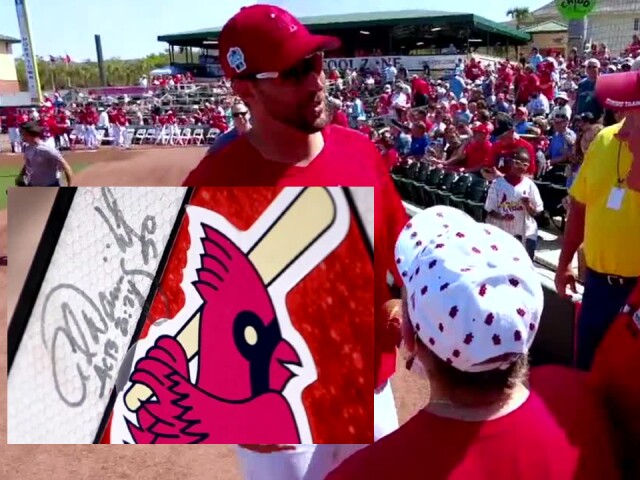 Cardinals pitcher surprises couple by autographing golf cart