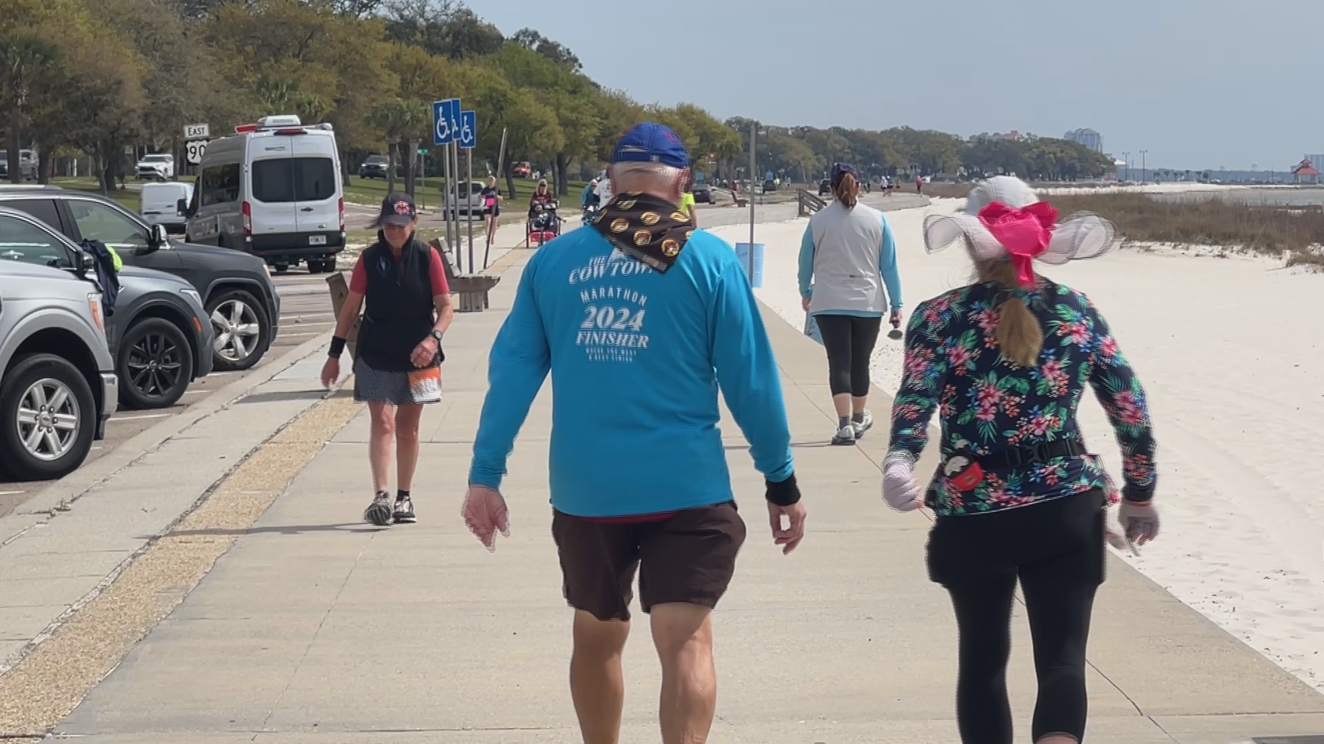 Dozens of runners gather along Mississippi Sound for national