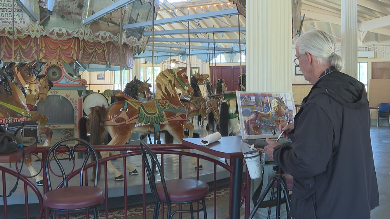 Artist Wyatt Waters paints Dentzel Carousel in Meridian